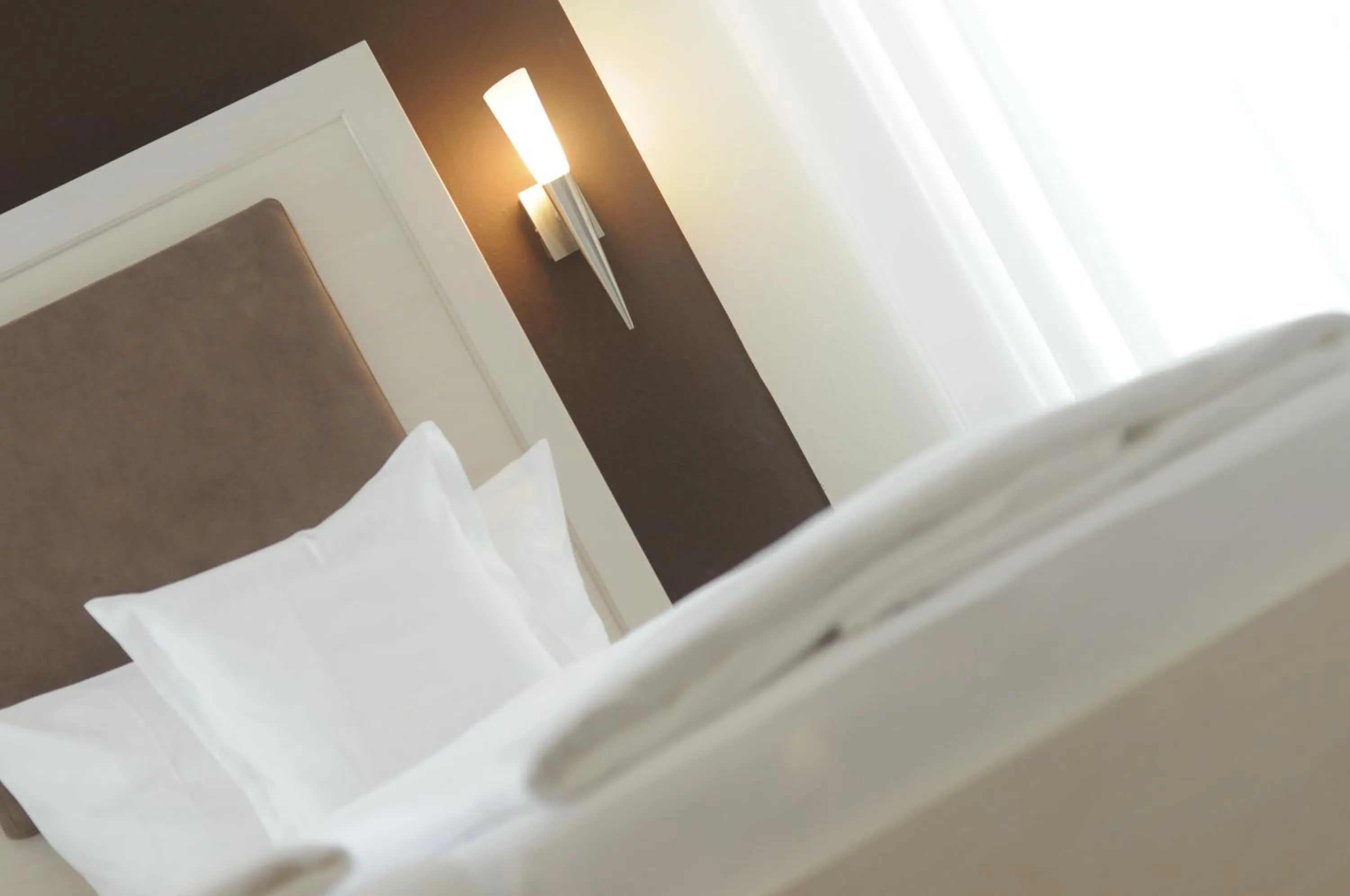 Bed in EWERTS Hotel