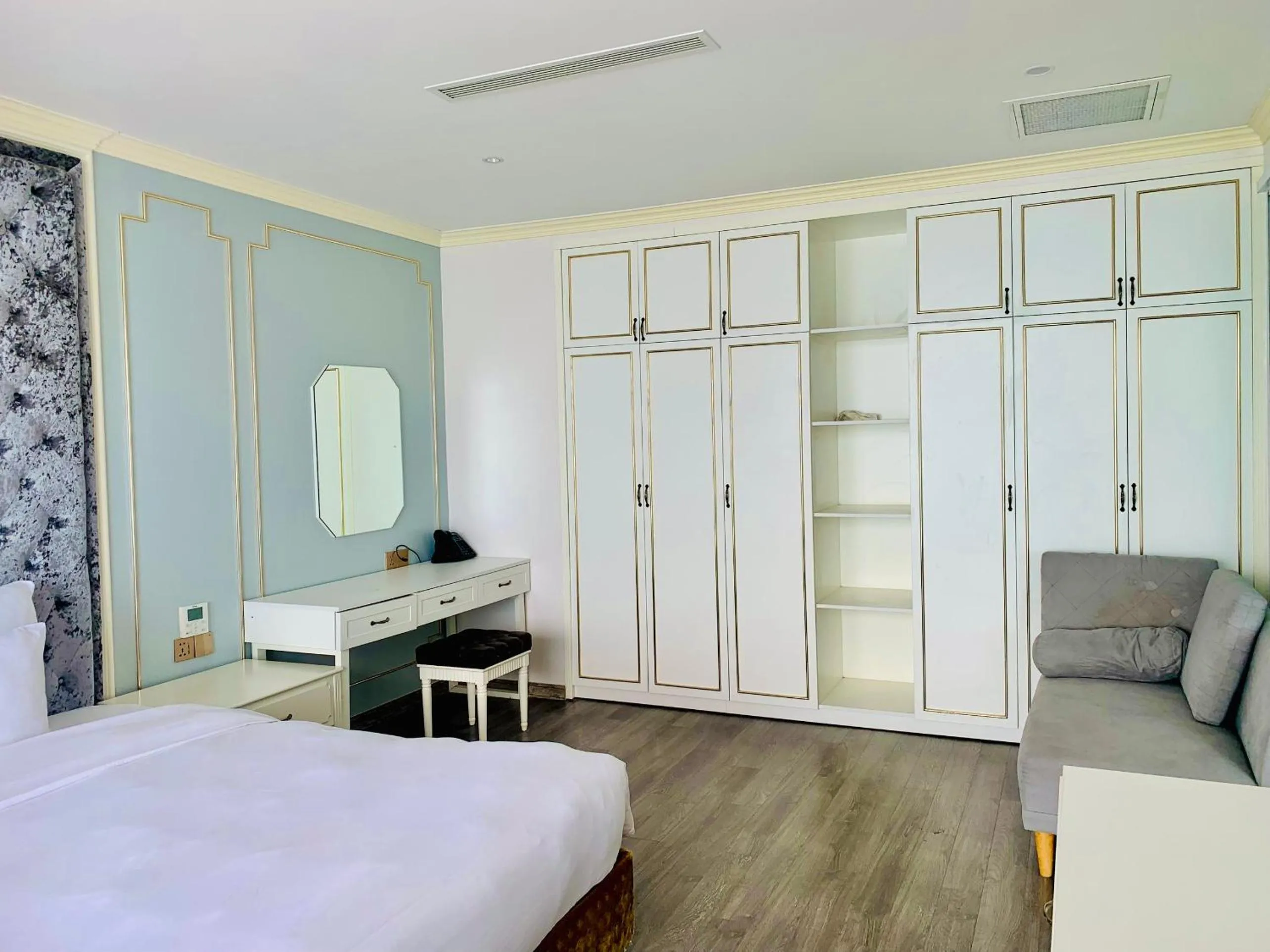 Bed in La Vague Hotel