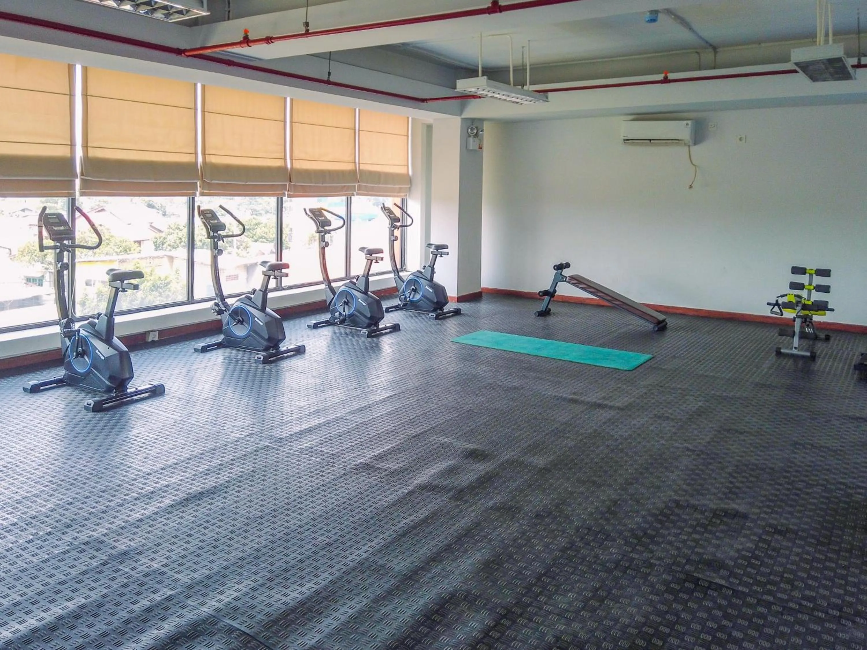 Fitness centre/facilities in Compact and Relaxing Studio at Dave Apartment By Travelio