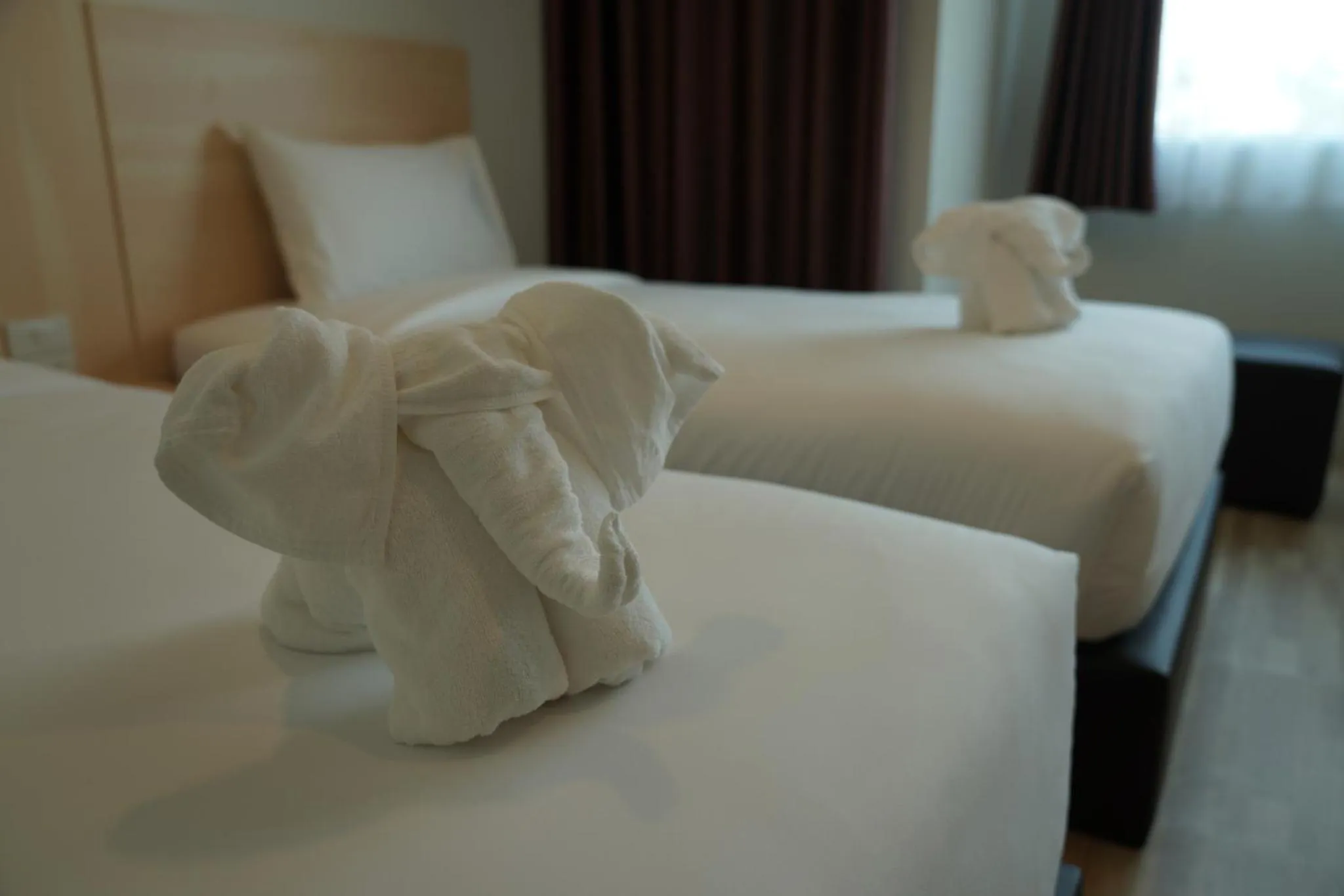 Bed in The charlotte smart hotel lopburi