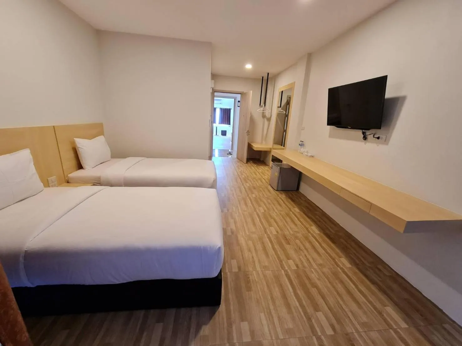 Bed in The charlotte smart hotel lopburi