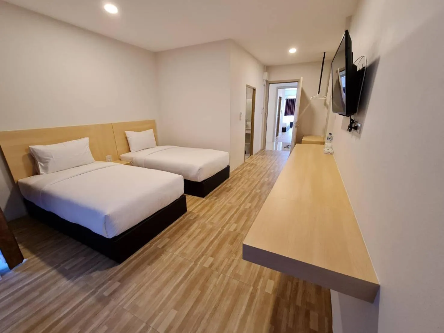 Bed in The charlotte smart hotel lopburi