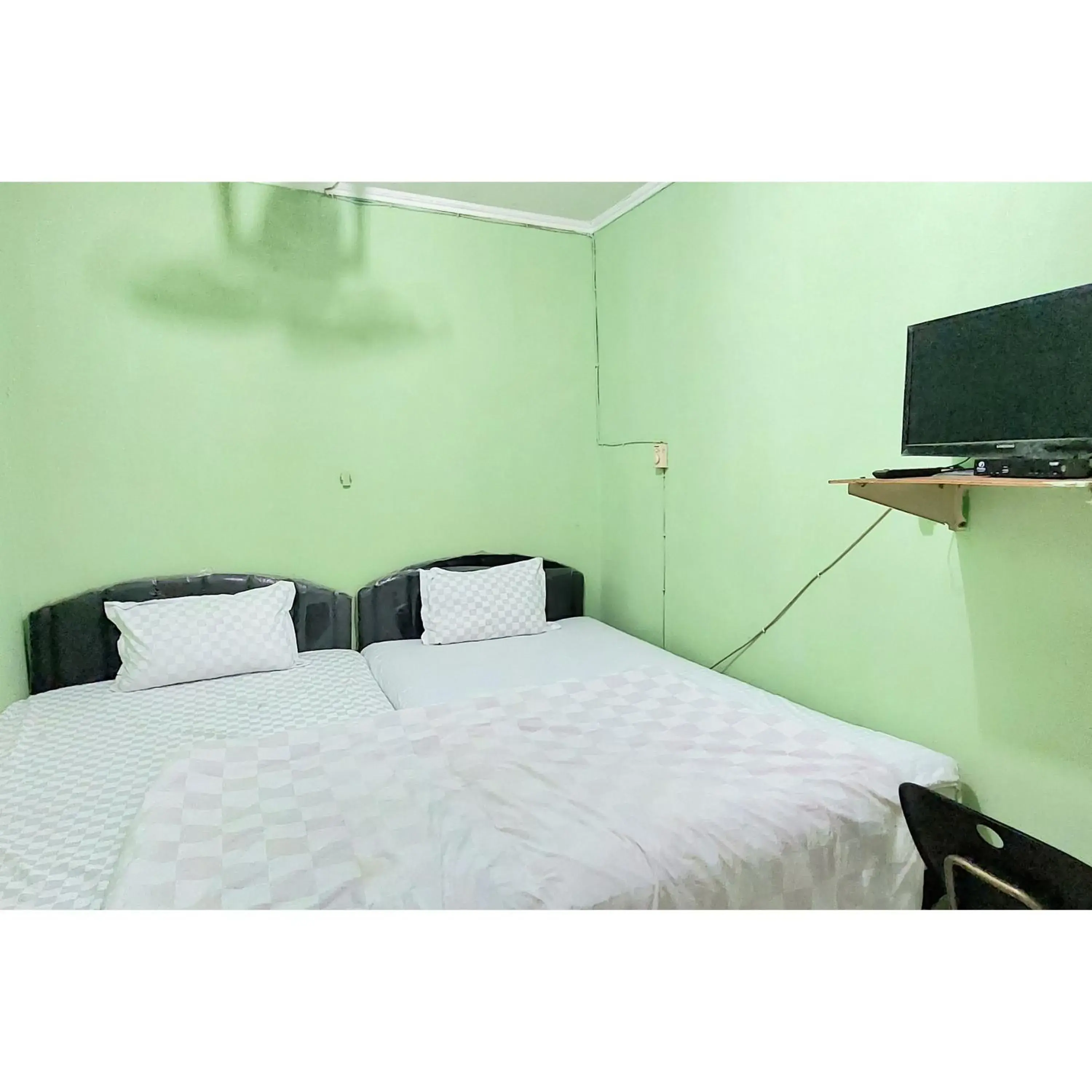 Bedroom, Bed in Surya Inn Syariah Cikarang RedPartner Bedroom, Bed in Surya Inn Syariah Cikarang RedPartner