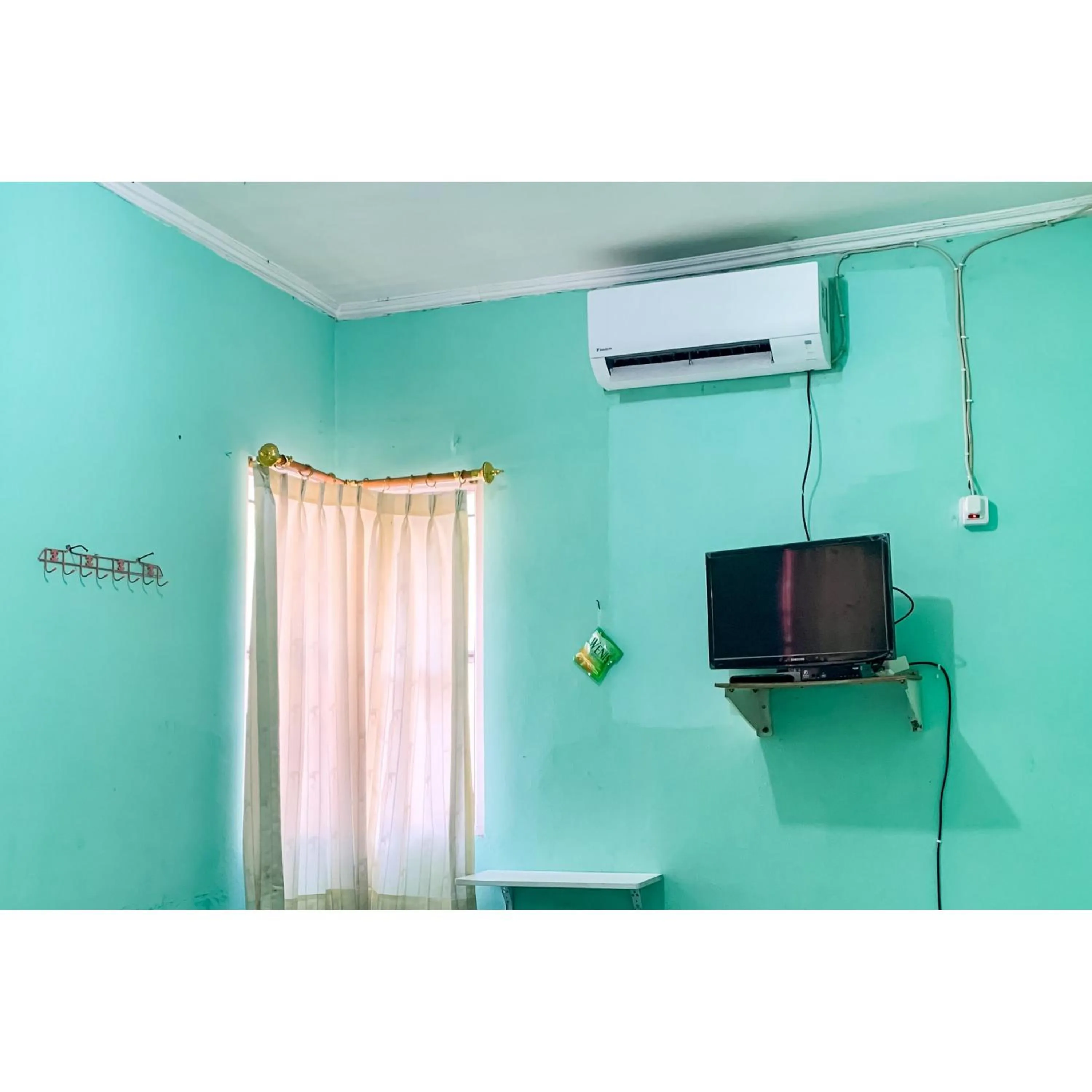 Bedroom in Surya Inn Syariah Cikarang RedPartner