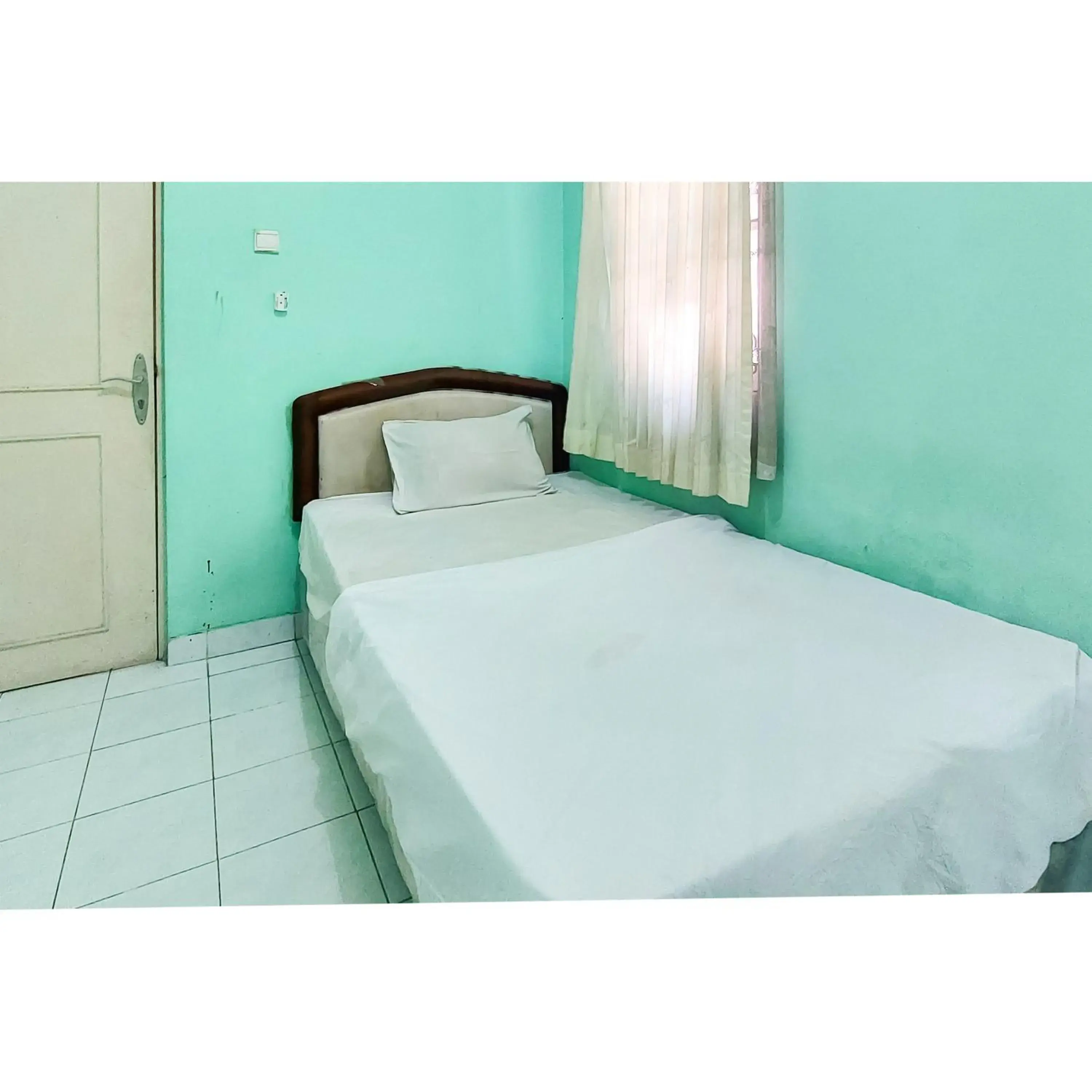 Bedroom, Bed in Surya Inn Syariah Cikarang RedPartner Bedroom, Bed in Surya Inn Syariah Cikarang RedPartner