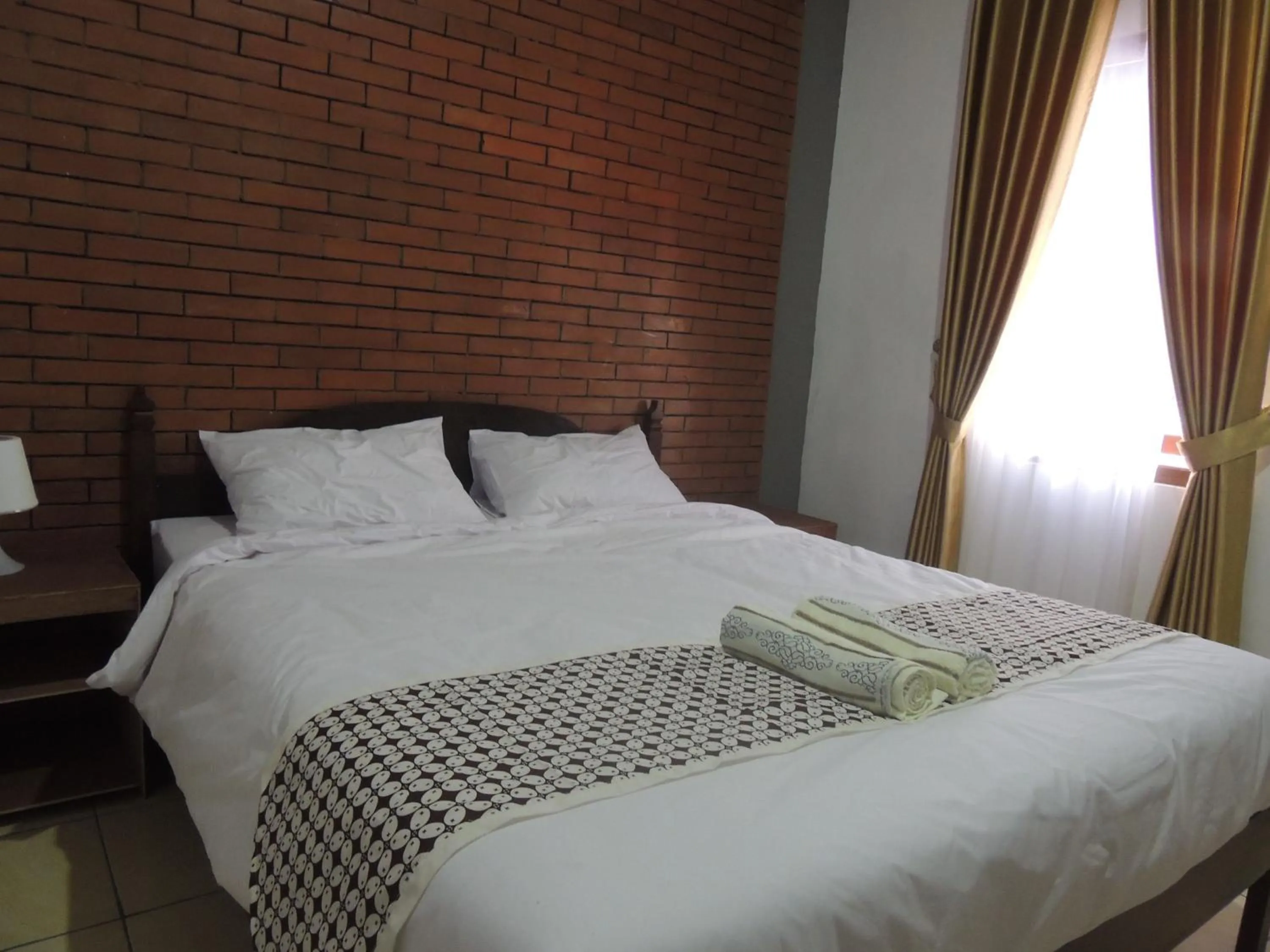 Bedroom in Omah Mardi Syariah by Ndalem Beong