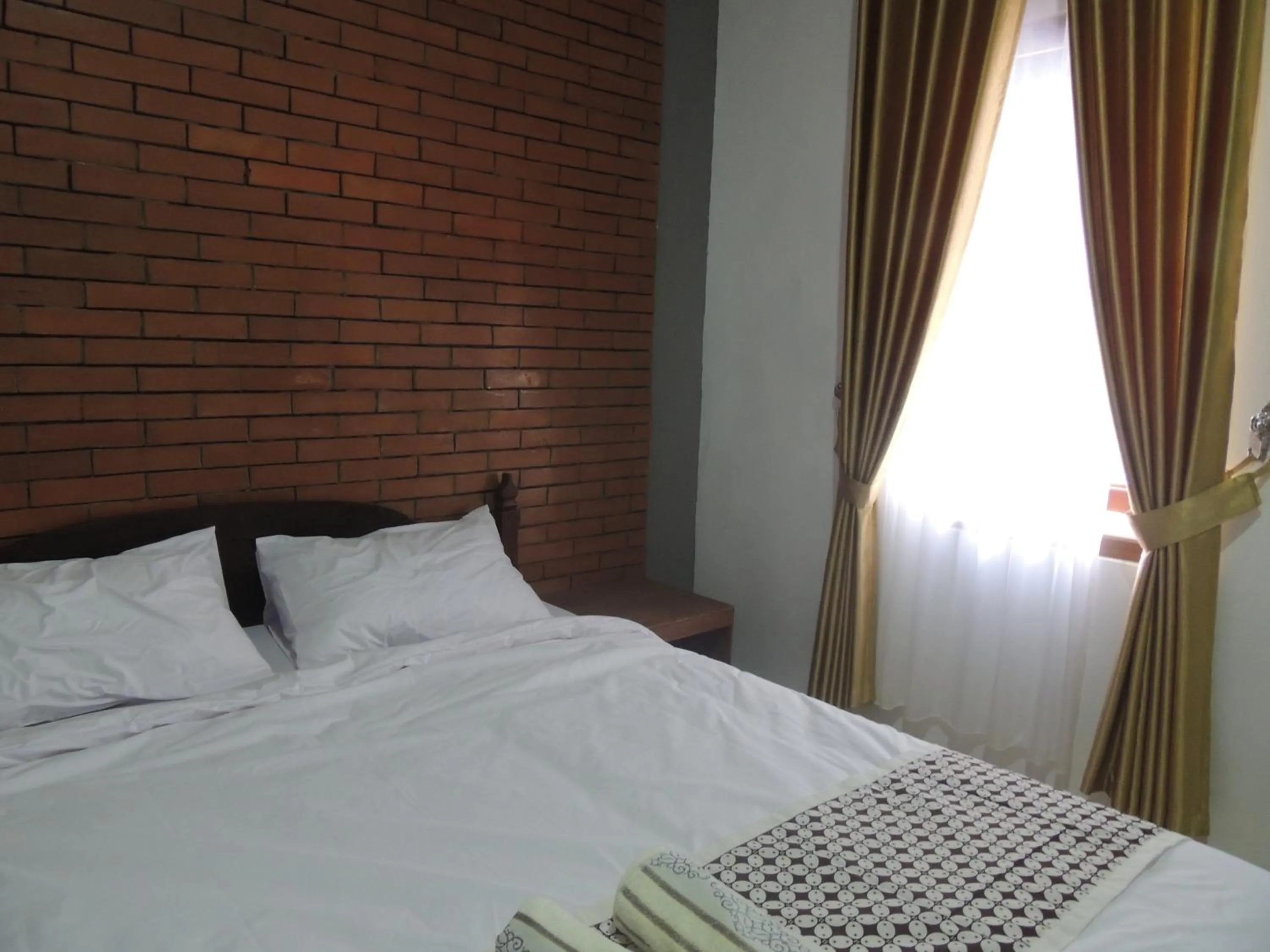 Bedroom in Omah Mardi Syariah by Ndalem Beong