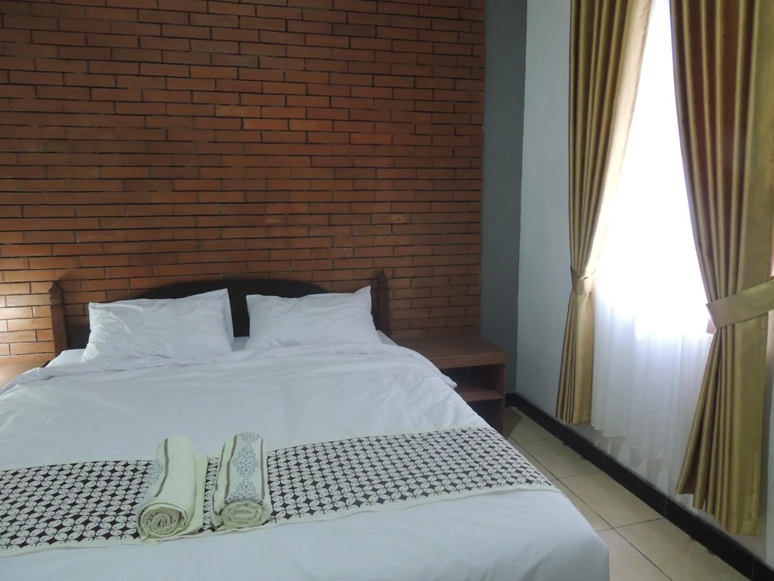 Bedroom in Omah Mardi Syariah by Ndalem Beong