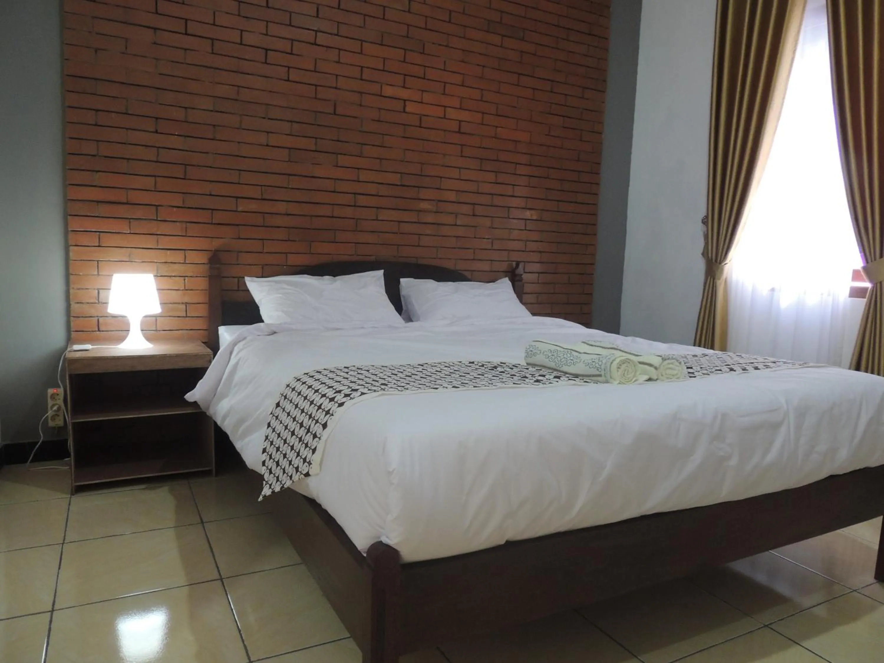 Bed in Omah Mardi Syariah by Ndalem Beong