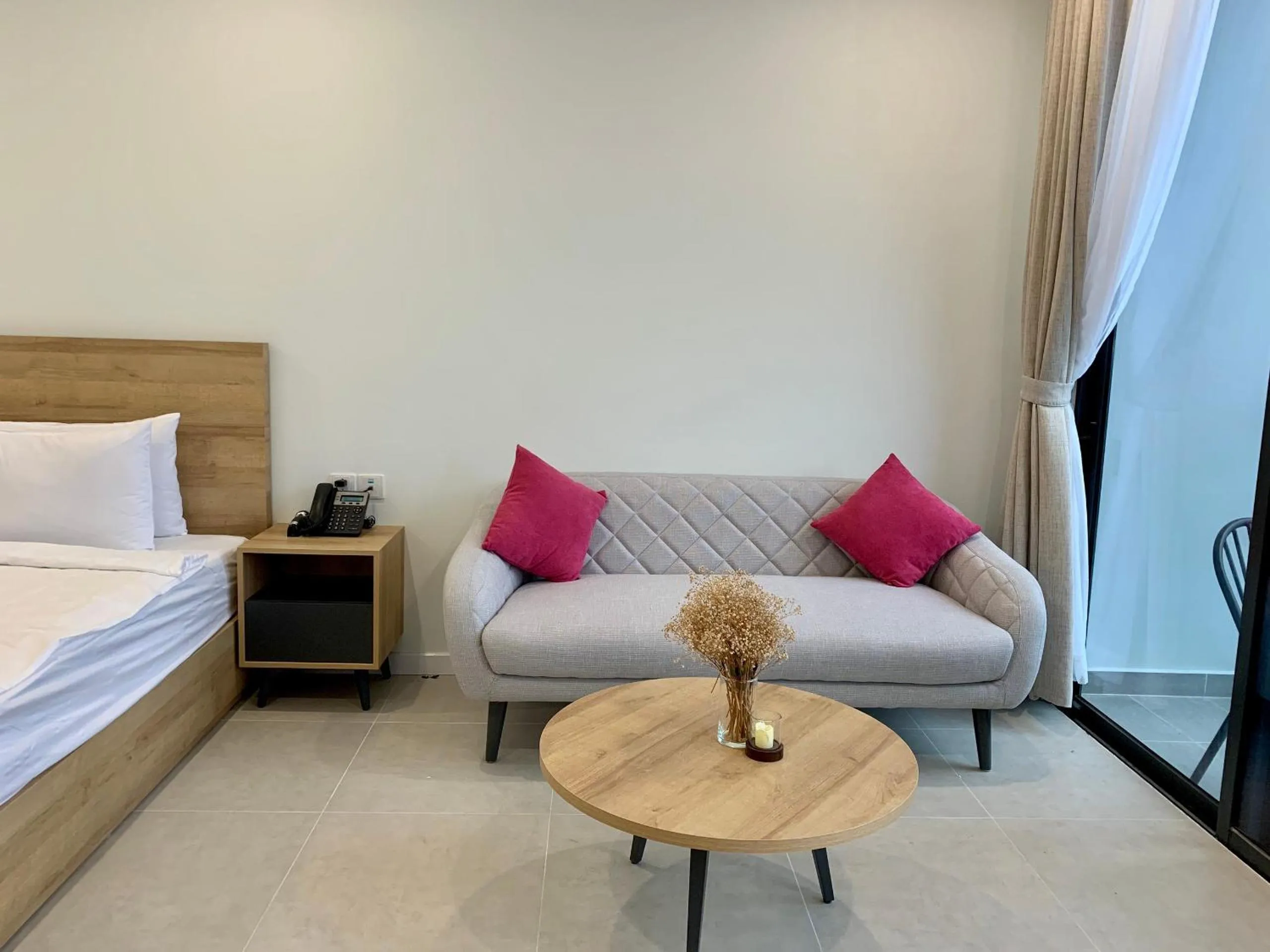 Bed in Wise Stay Scenia Bay Apartment