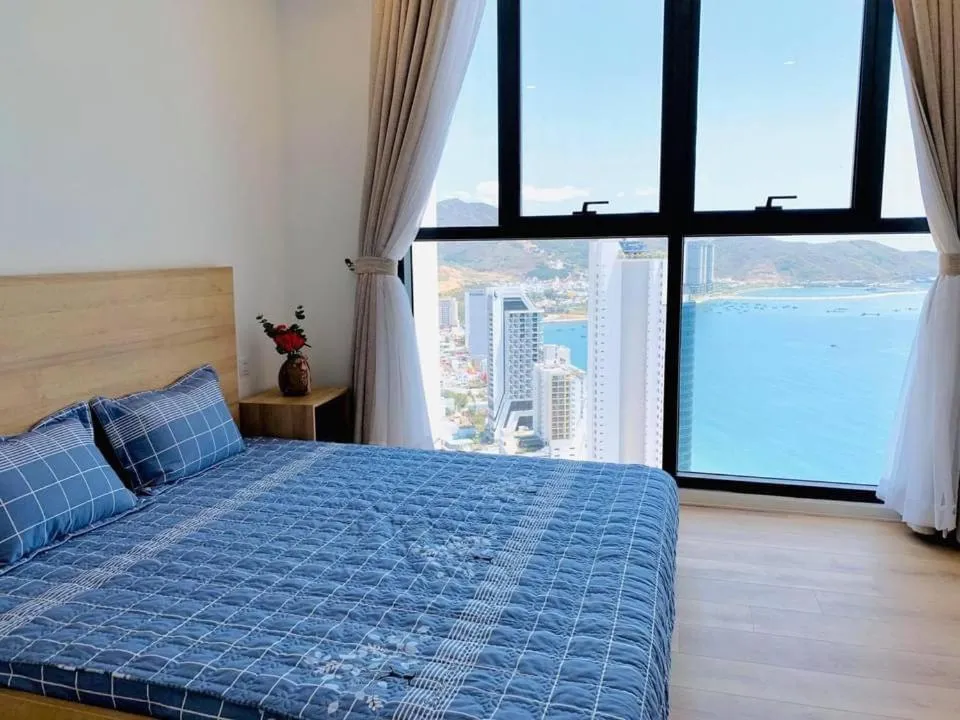 Bed in Wise Stay Scenia Bay Apartment