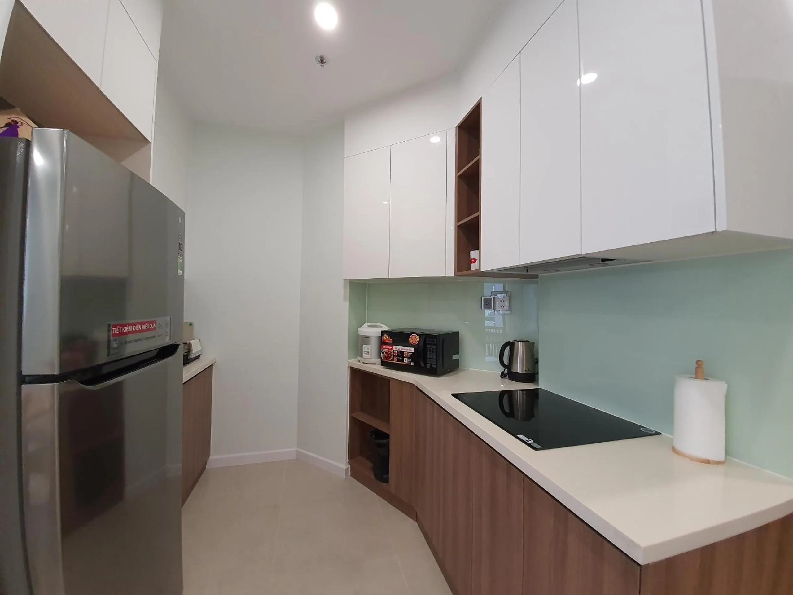 Kitchen or kitchenette in Wise Stay Scenia Bay Apartment