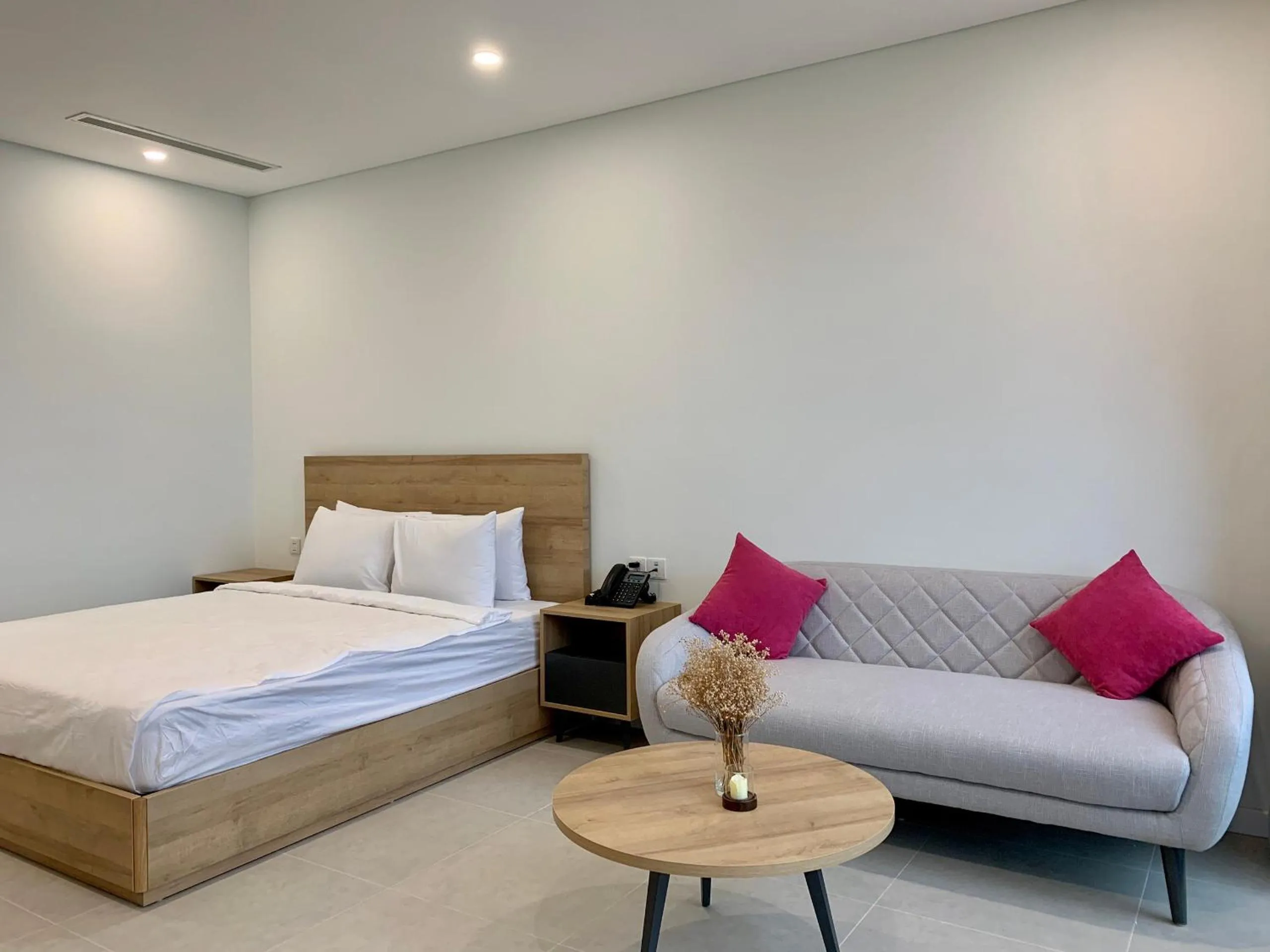 Bed in Wise Stay Scenia Bay Apartment