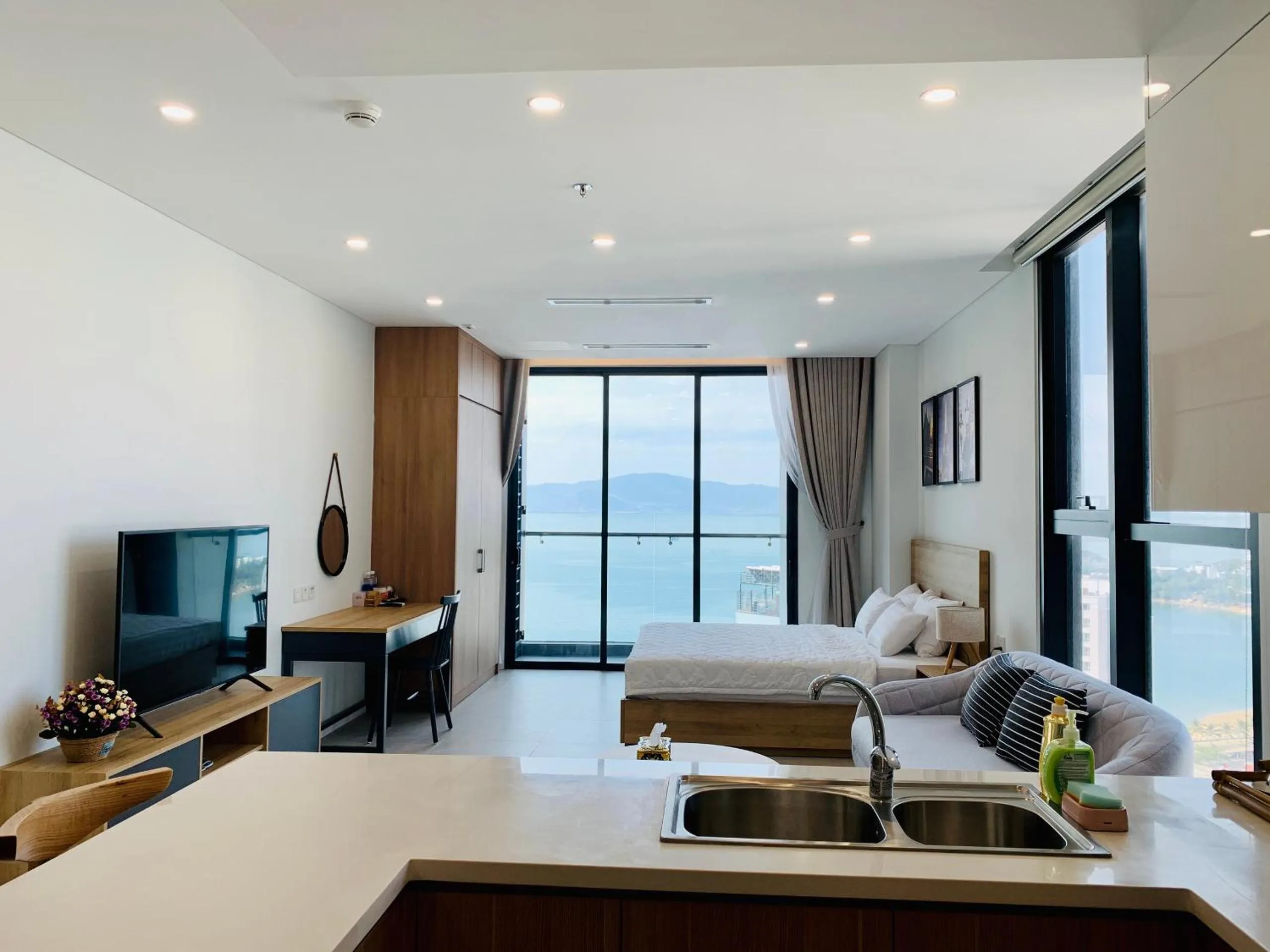 Bed in Wise Stay Scenia Bay Apartment