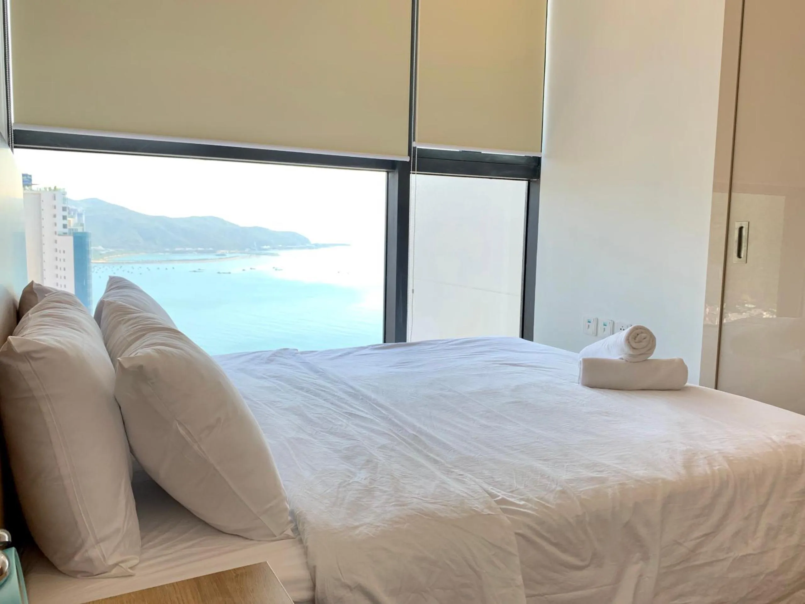 Bed in Wise Stay Scenia Bay Apartment
