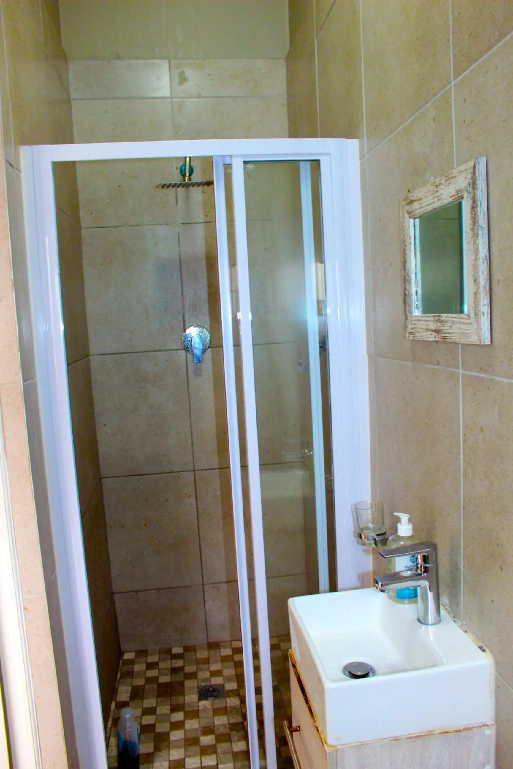 Shower in 103onWallace Self Catering Guest House