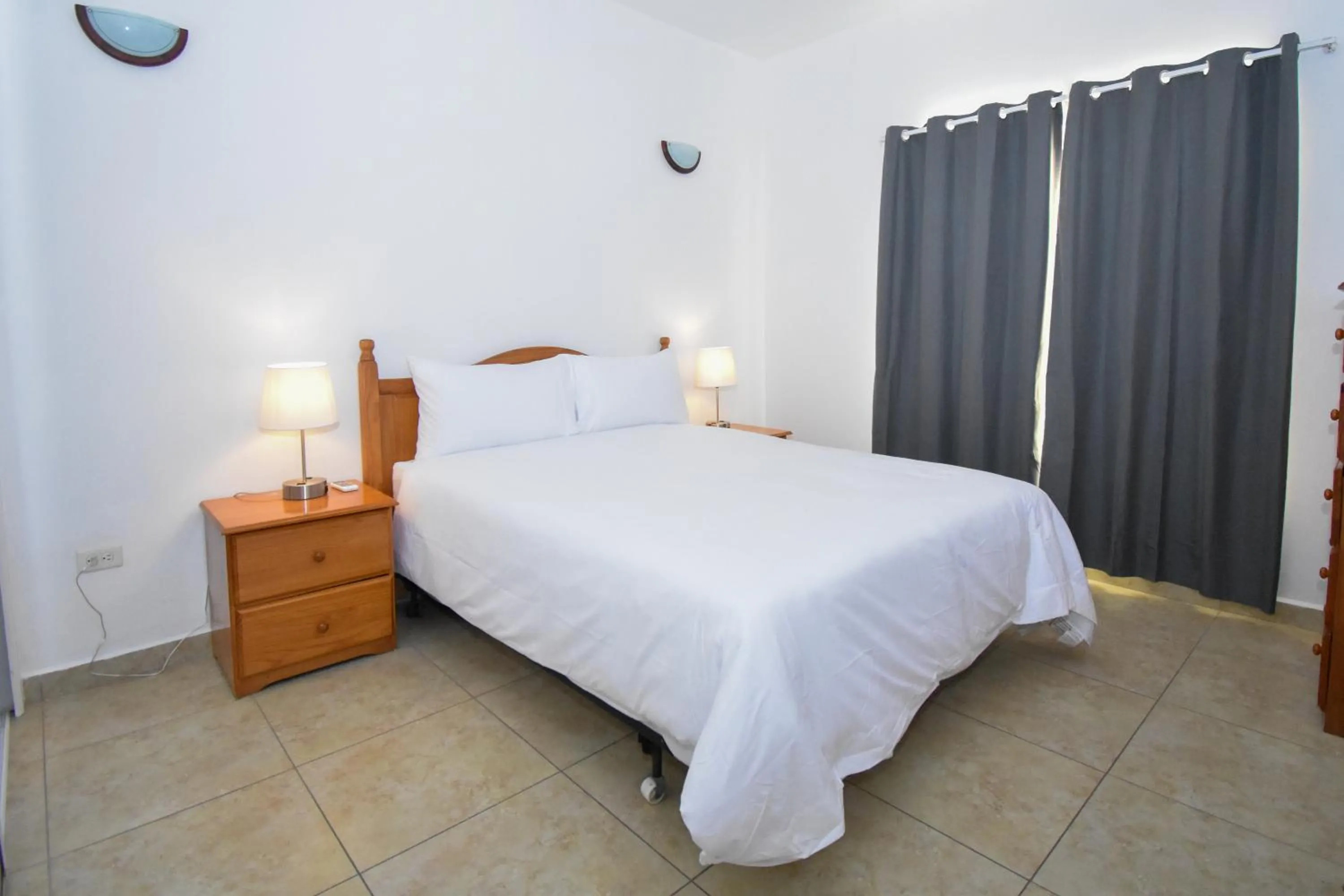 Bed in Lord Nelson Hotel & Residences