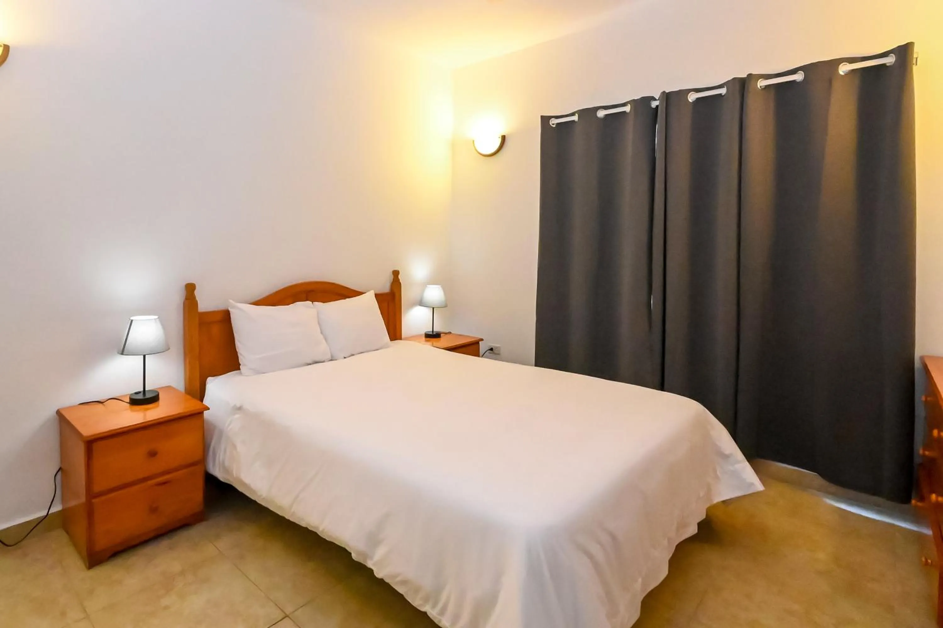 Bed in Lord Nelson Hotel & Residences