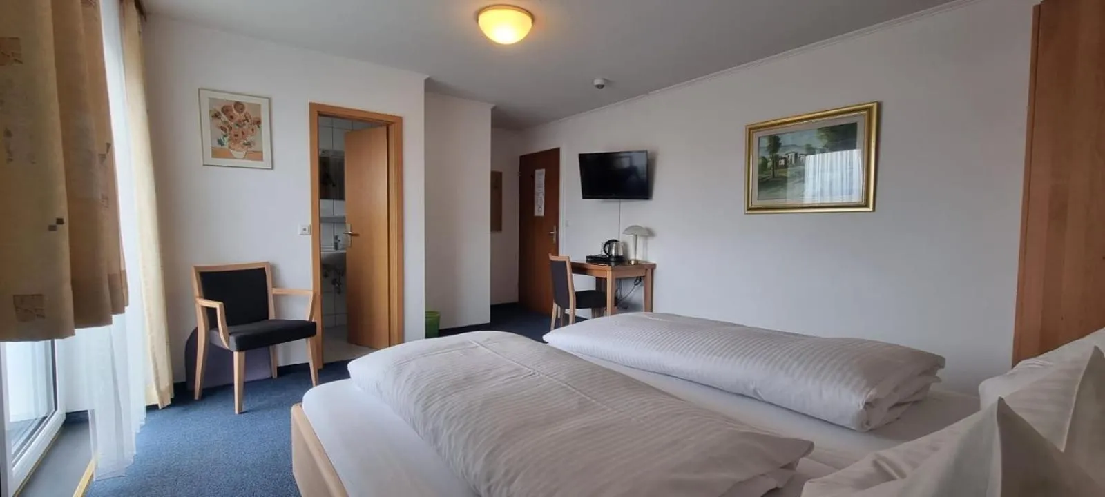 Photo of the whole room, Bed in Hotel Seehalde