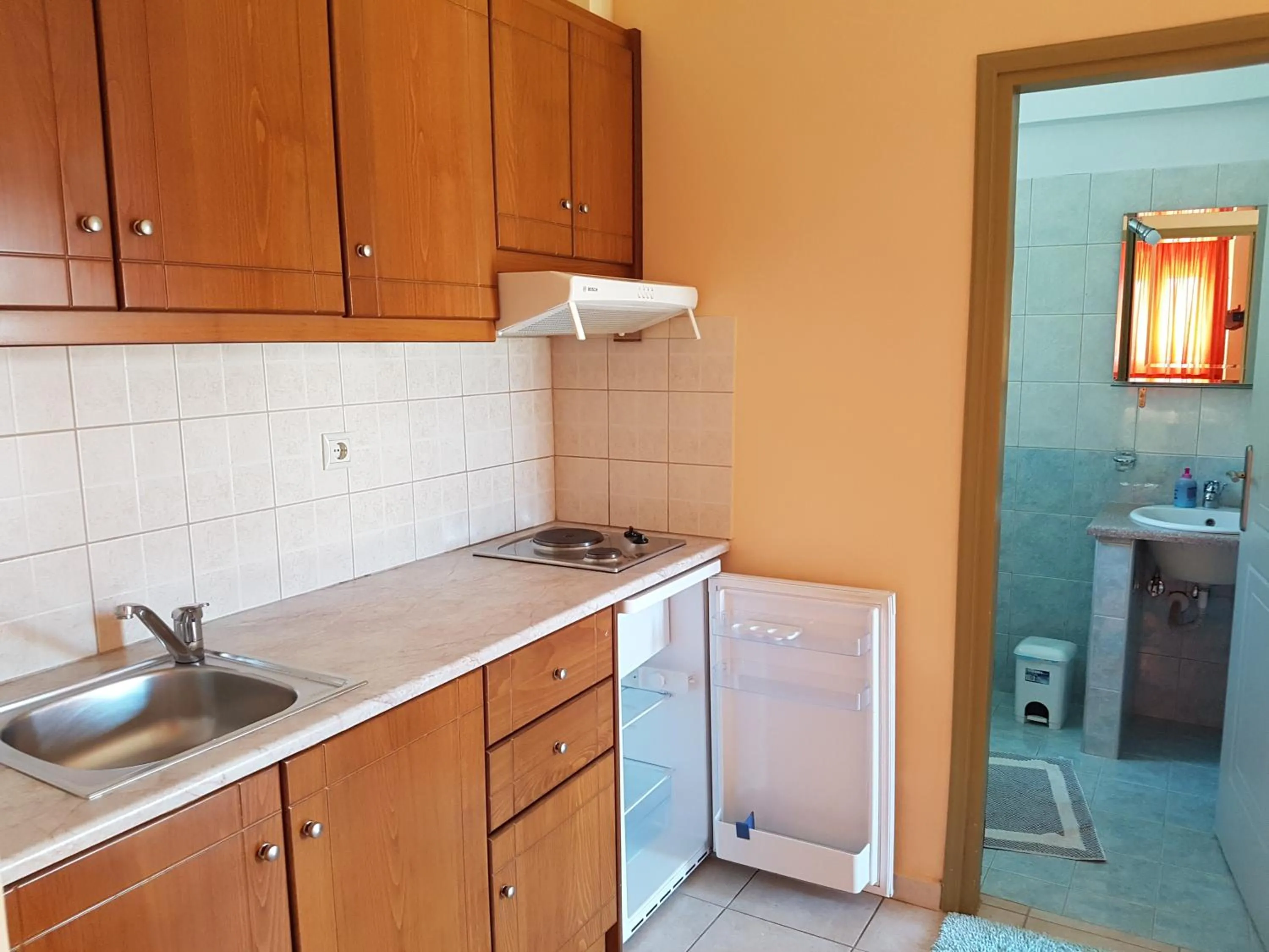 Kitchen or kitchenette in Bayside Apartments