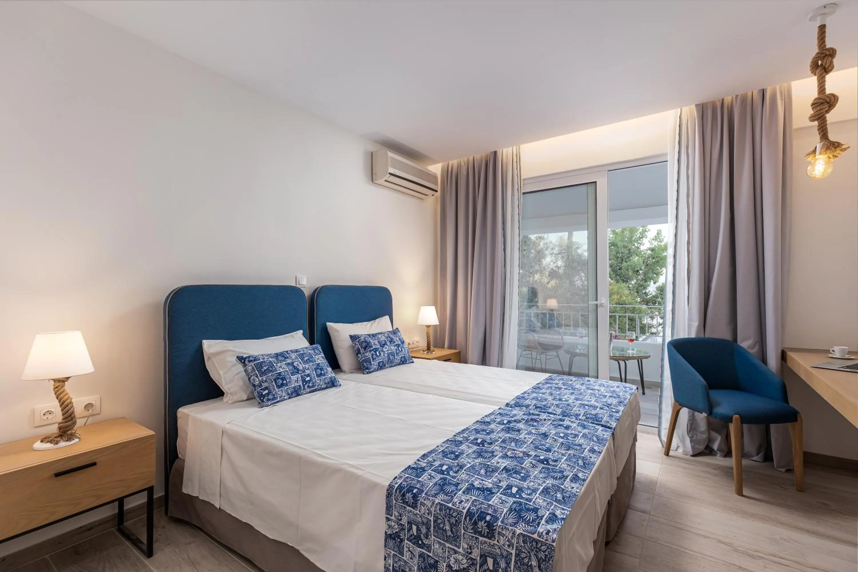 Bed in Sirocco Hotel