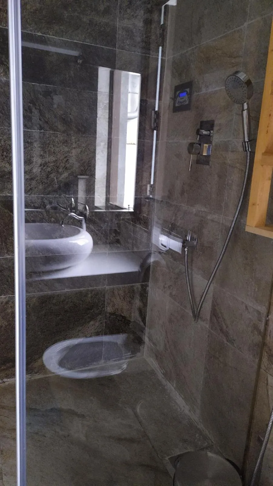 Bathroom in COTTAGES BY THE CREEK.