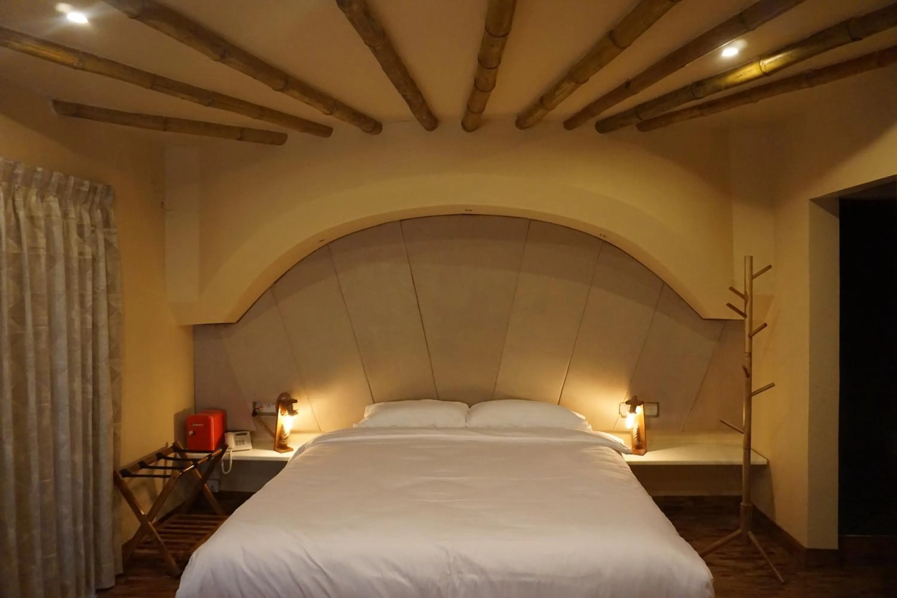 Bed in COTTAGES BY THE CREEK.