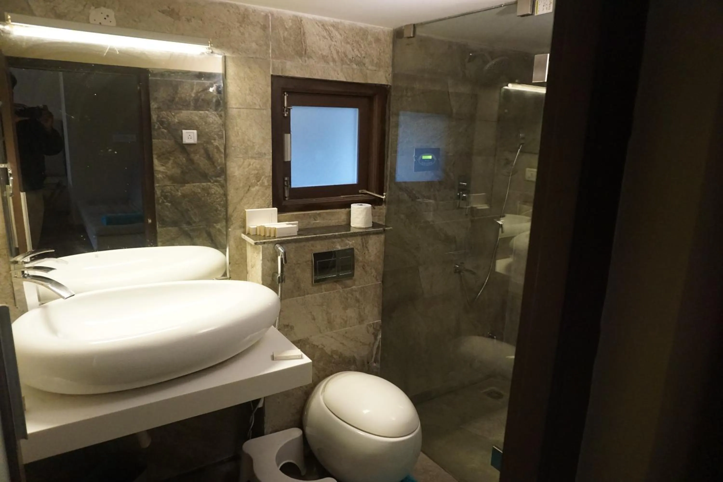 Bathroom in COTTAGES BY THE CREEK.