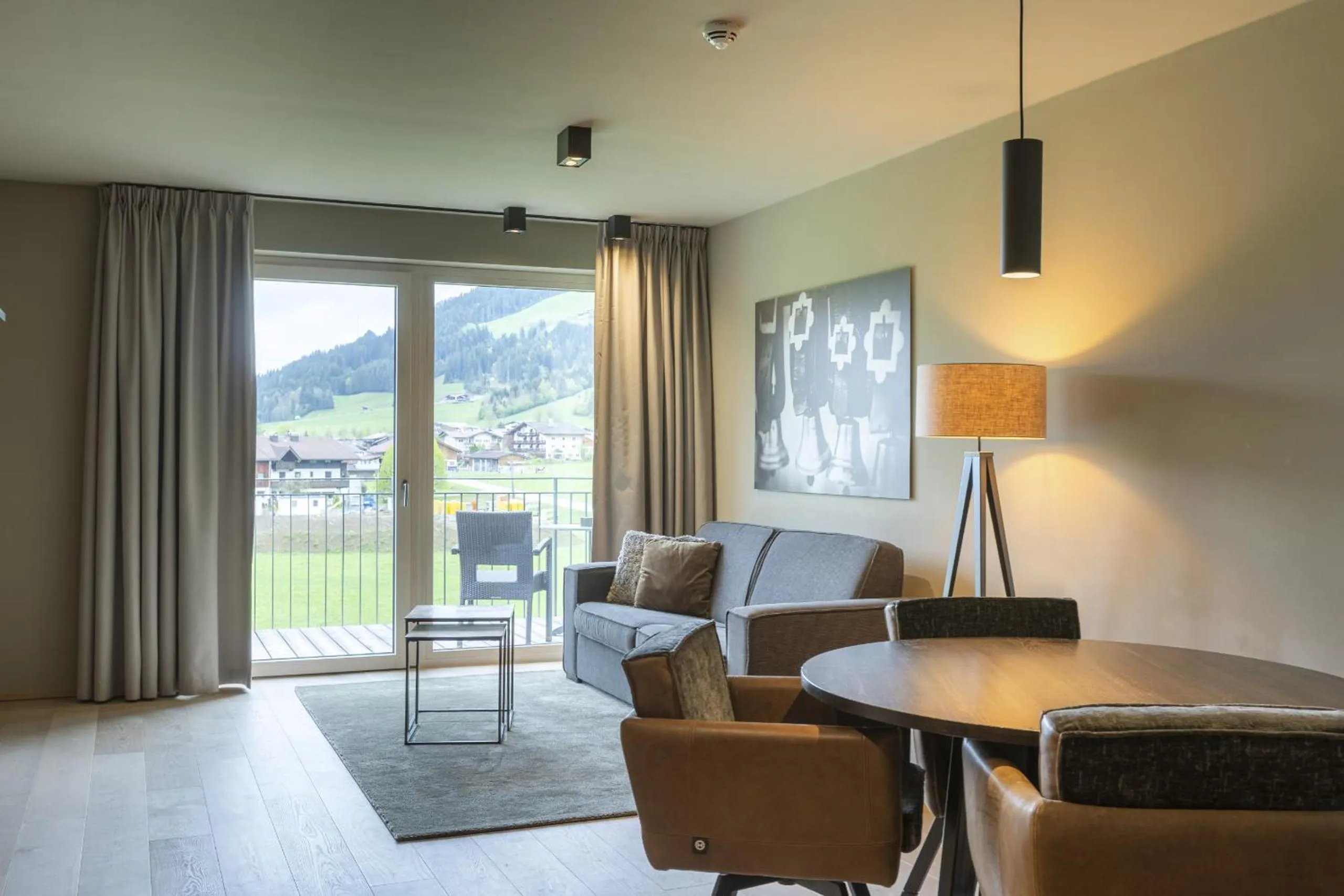 Living room in Berg & Golf Resort Westendorf by ALPS RESORTS