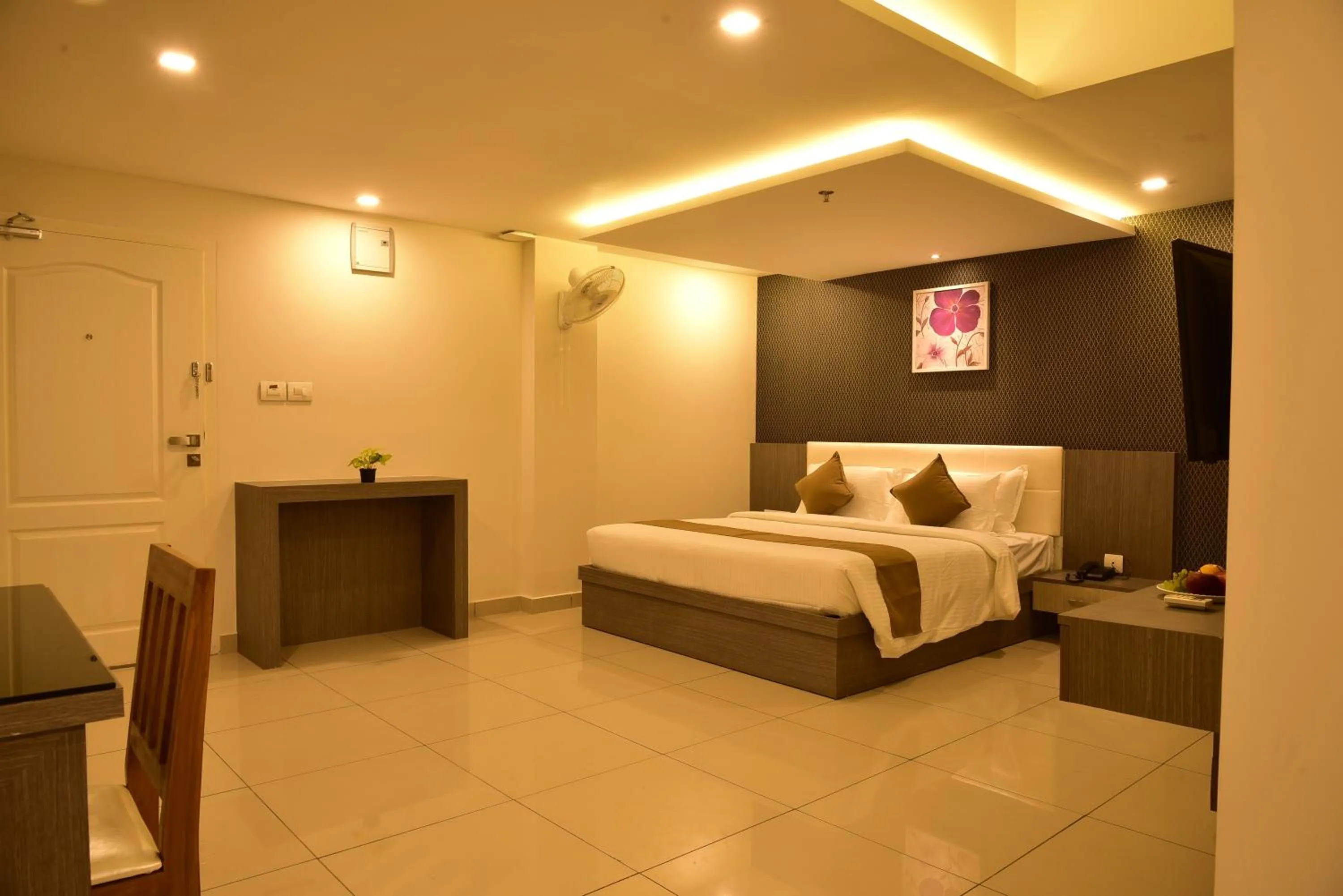 Bed in WHITE SUITE HOTEL