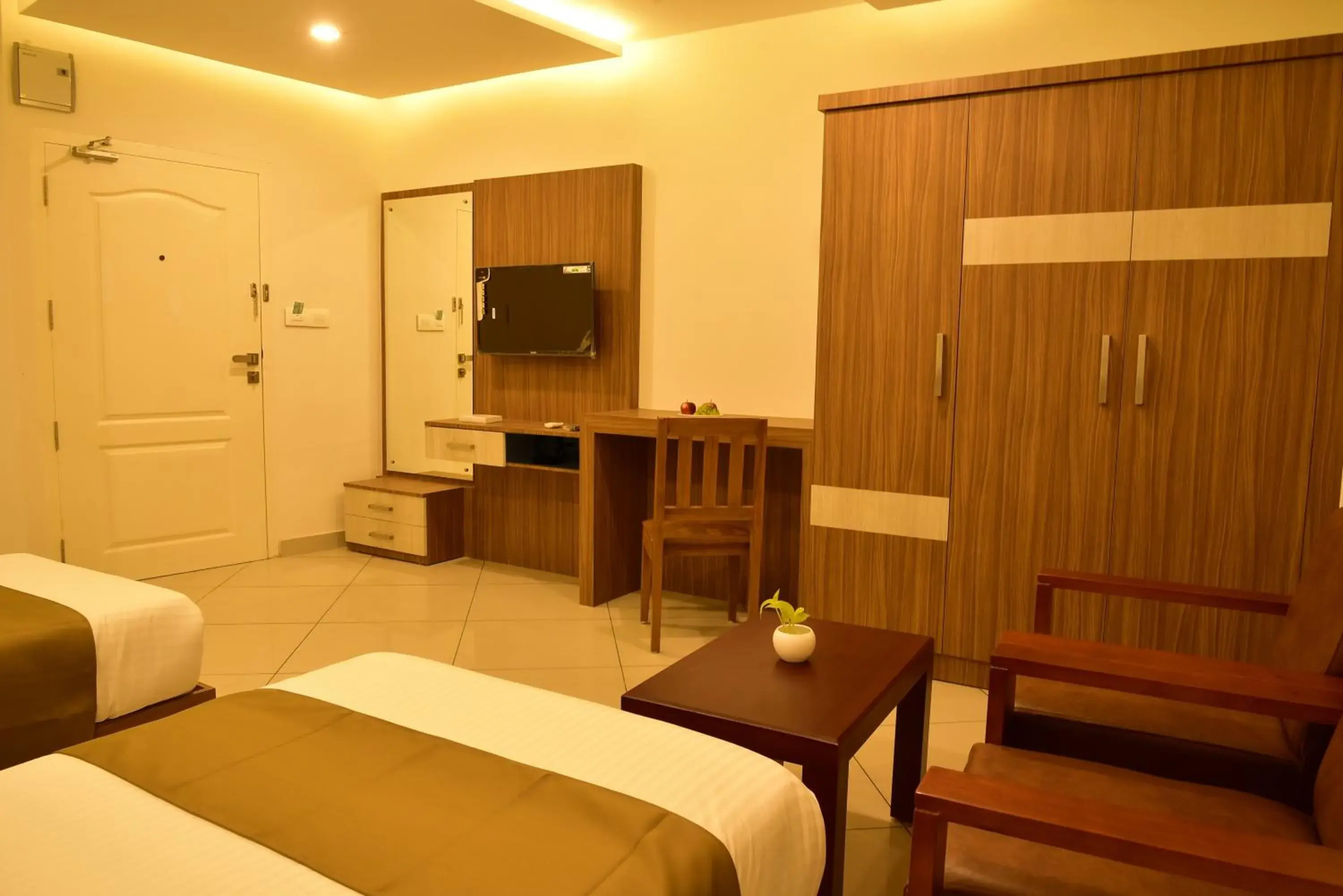 Bed in WHITE SUITE HOTEL Bed in WHITE SUITE HOTEL