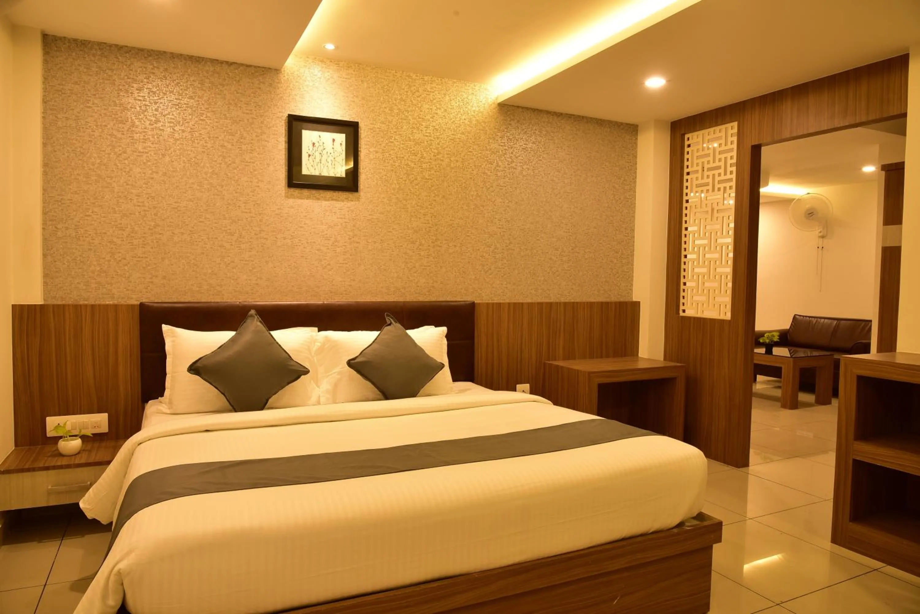 Bed in WHITE SUITE HOTEL