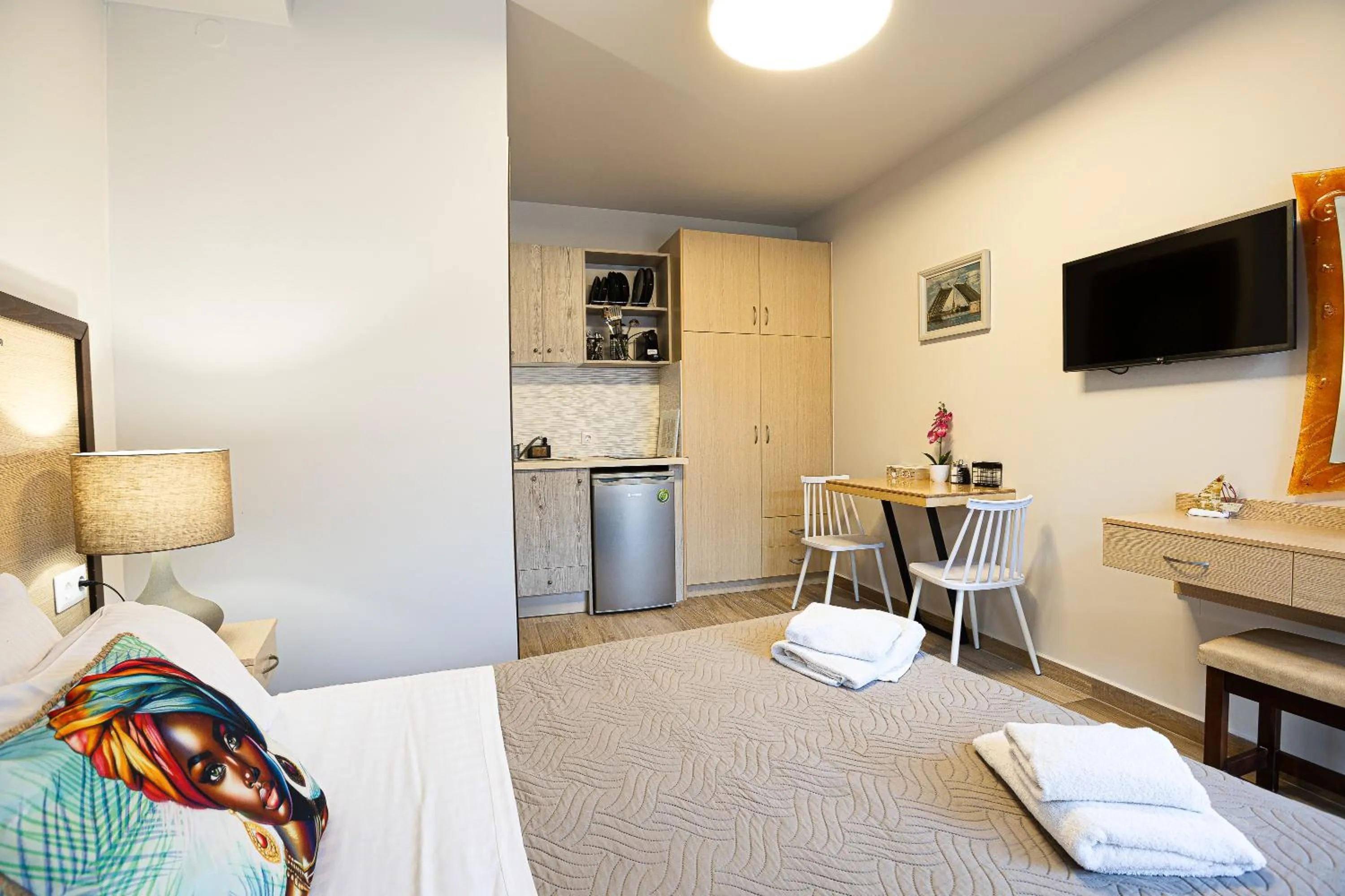 Bed in Akrogiali Apartments