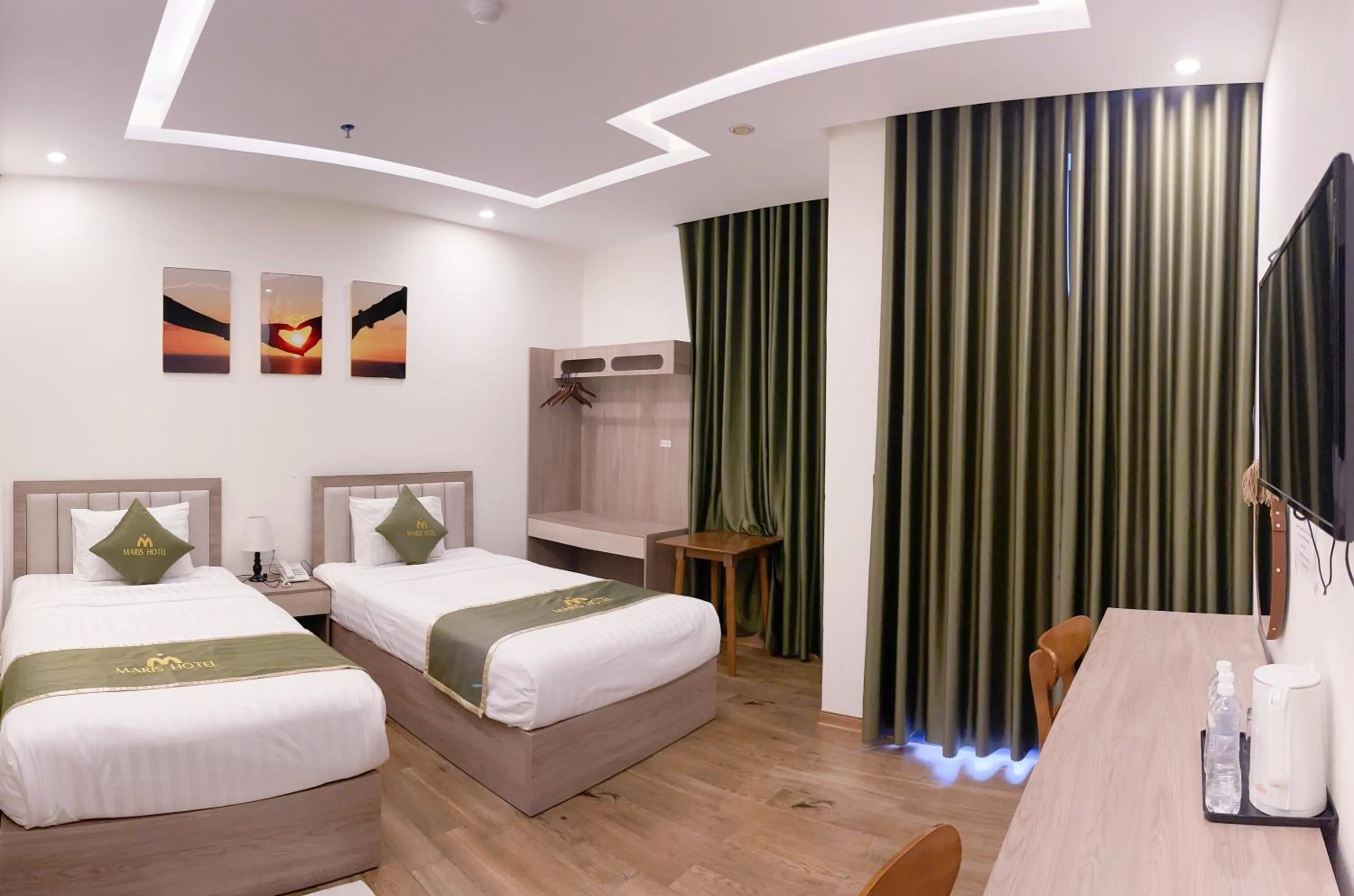 Bed in Maris Da Nang Hotel & Apartment