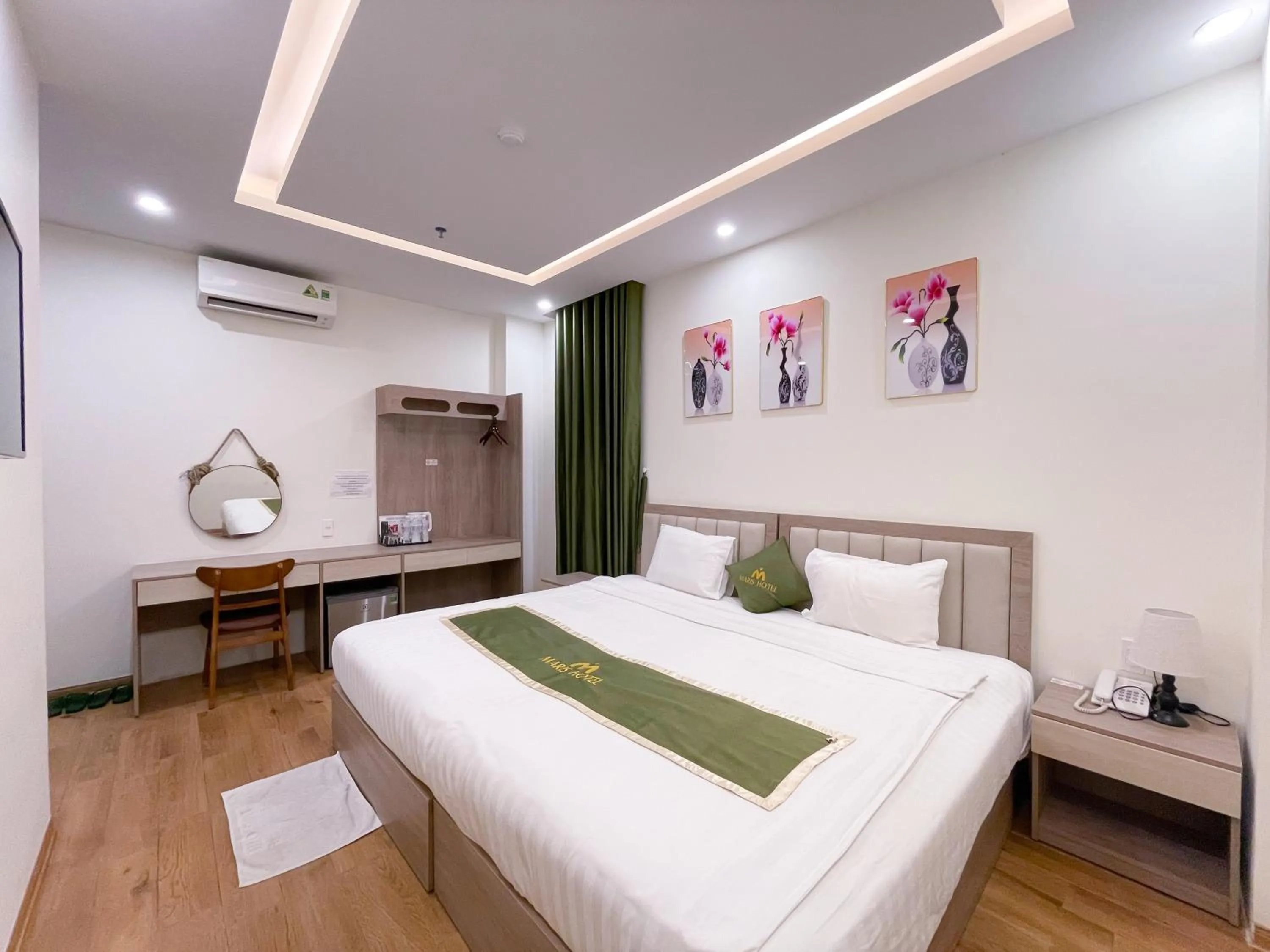 Bed in Maris Da Nang Hotel & Apartment