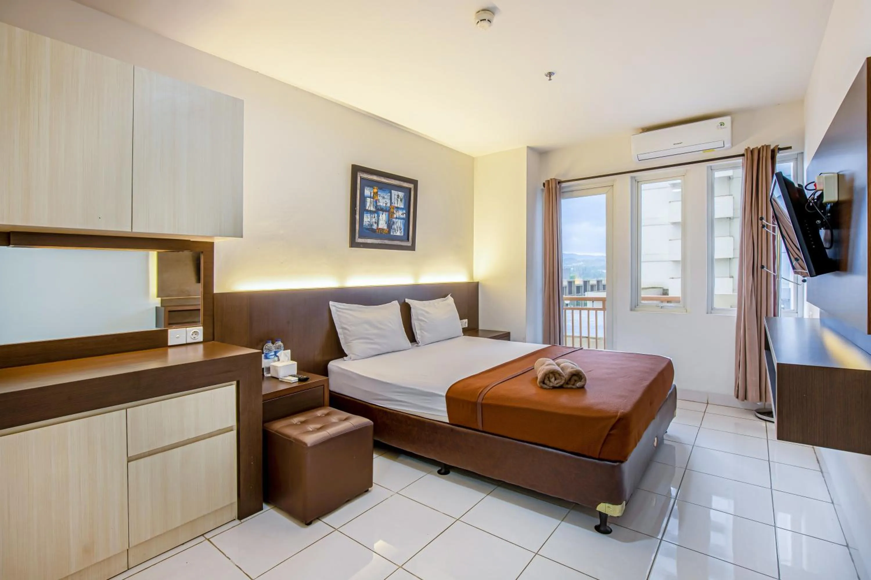 Bed in Skyview Sentul Tower Apartments