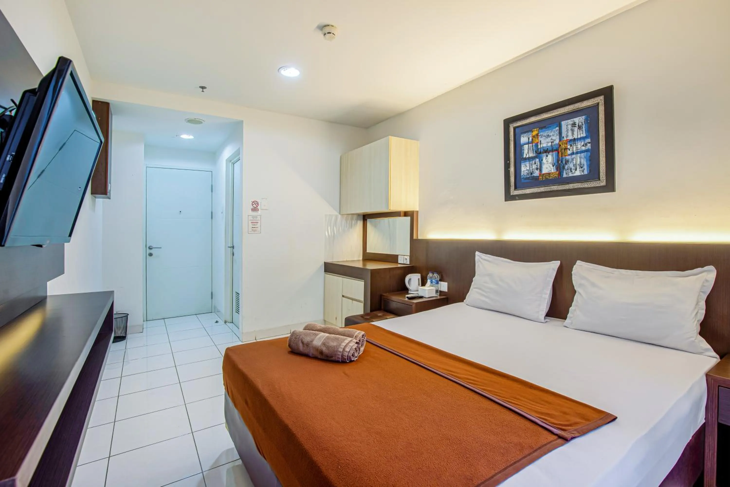 Bed in Skyview Sentul Tower Apartments