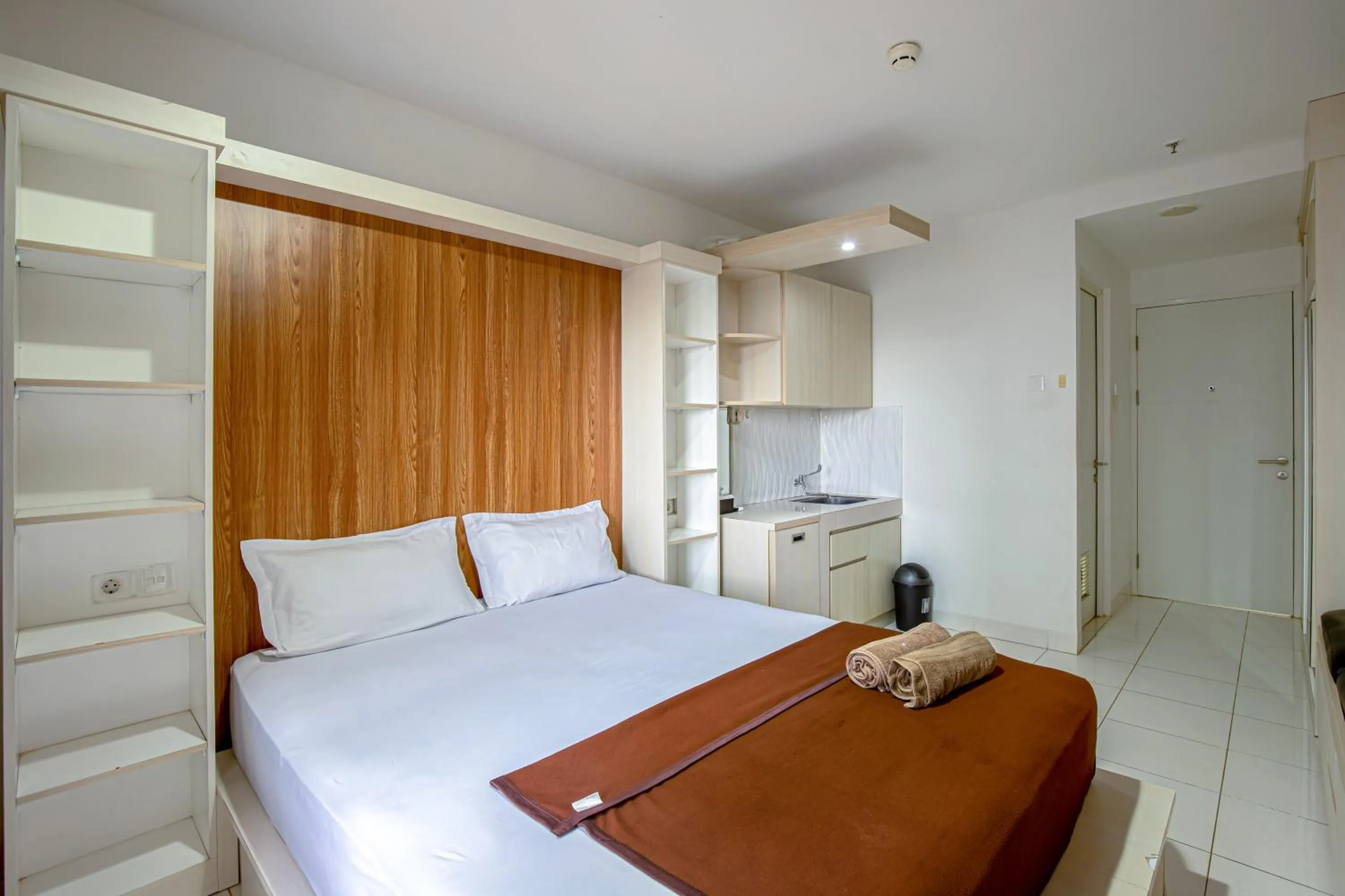 Bed in Skyview Sentul Tower Apartments