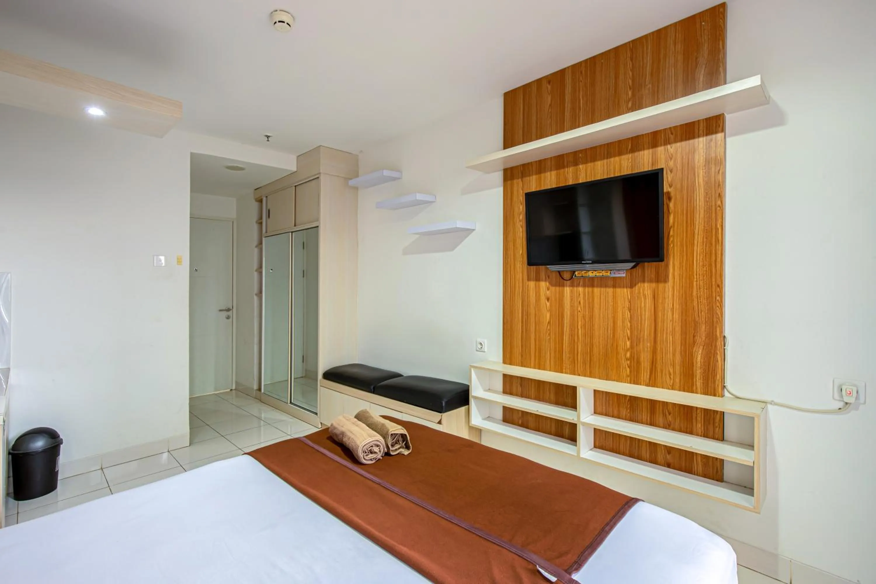 Bed in Skyview Sentul Tower Apartments