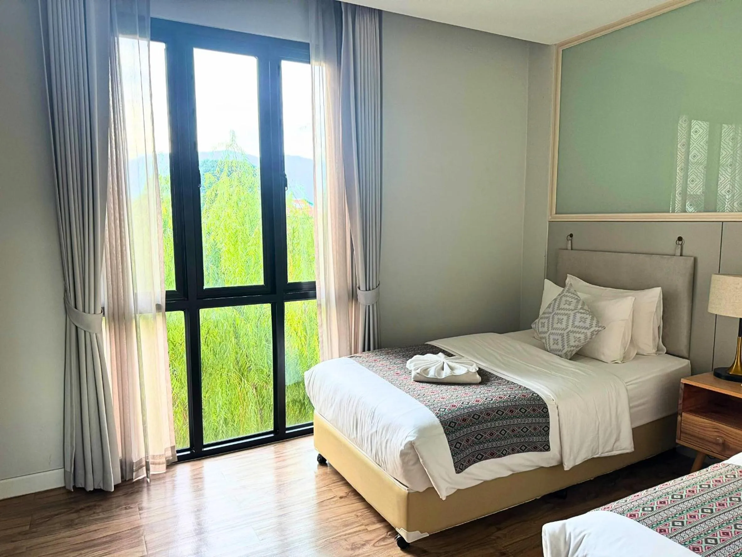 Bed in Lanna Bonita Boutique Hotel