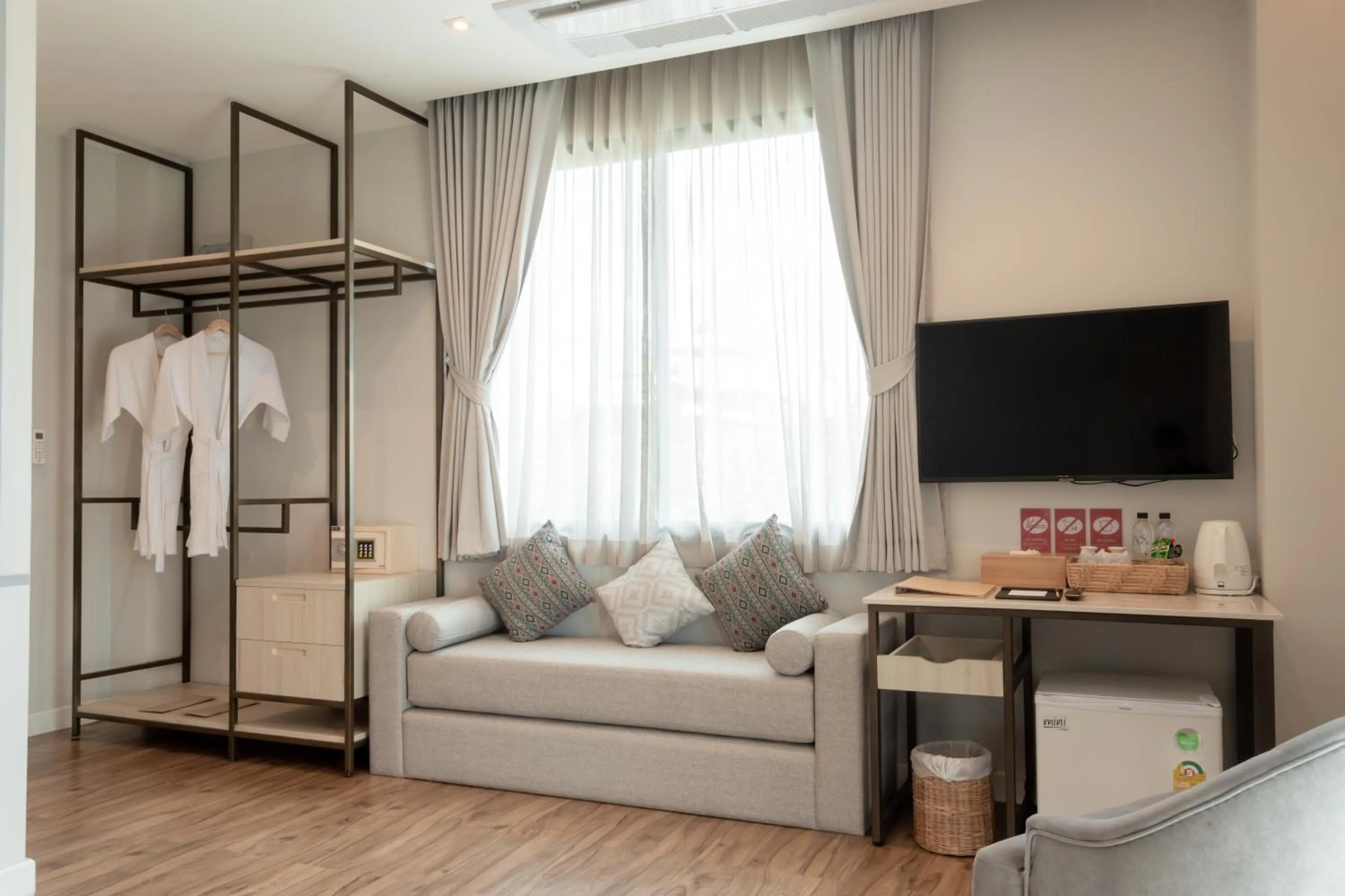 Communal lounge/ TV room in Lanna Bonita Boutique Hotel