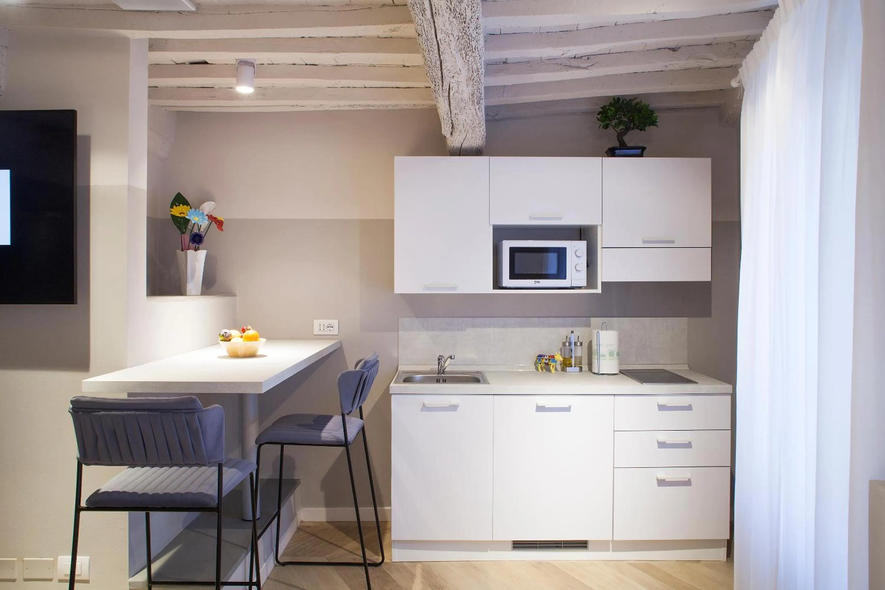 Kitchen or kitchenette in San Sebastiano Suite & Luxury Apartments