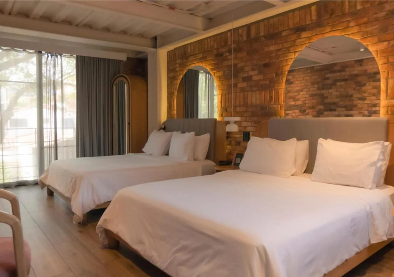 Bed in Nomada Hotel Origen