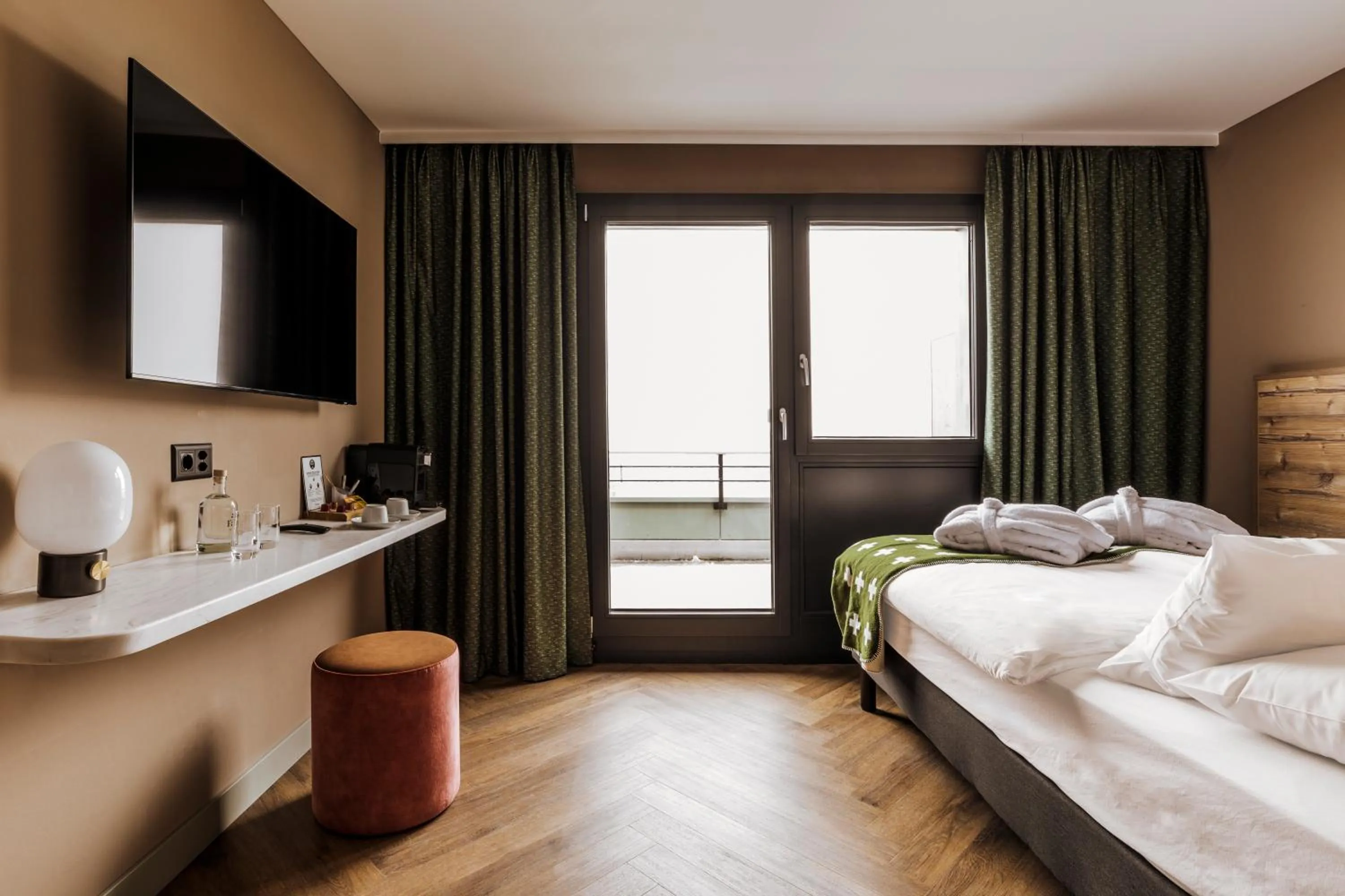 Bedroom, Bed in Hotel Valaisia Crans Montana, a Faern Collection Resort