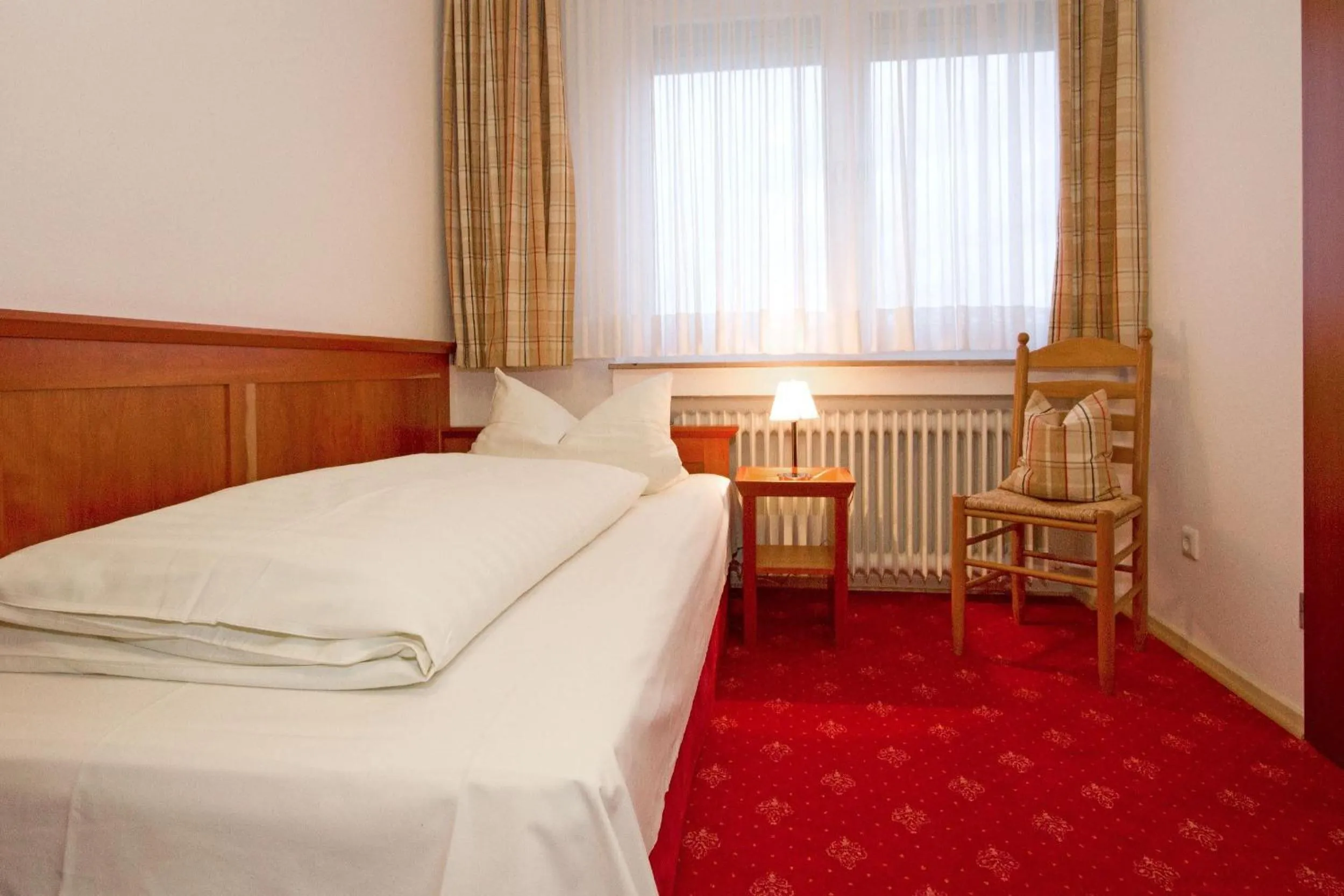 Bed in Hotel Mennicken