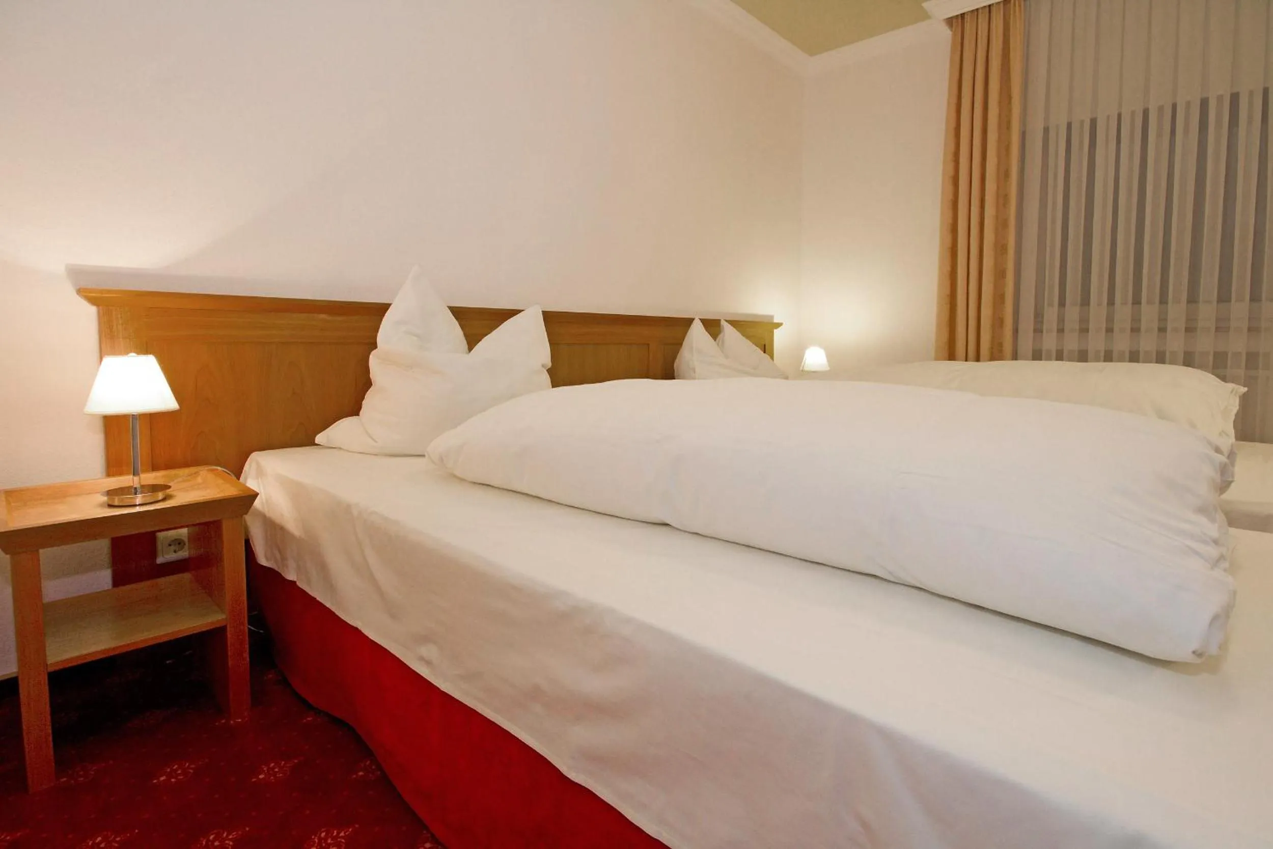 Bed in Hotel Mennicken