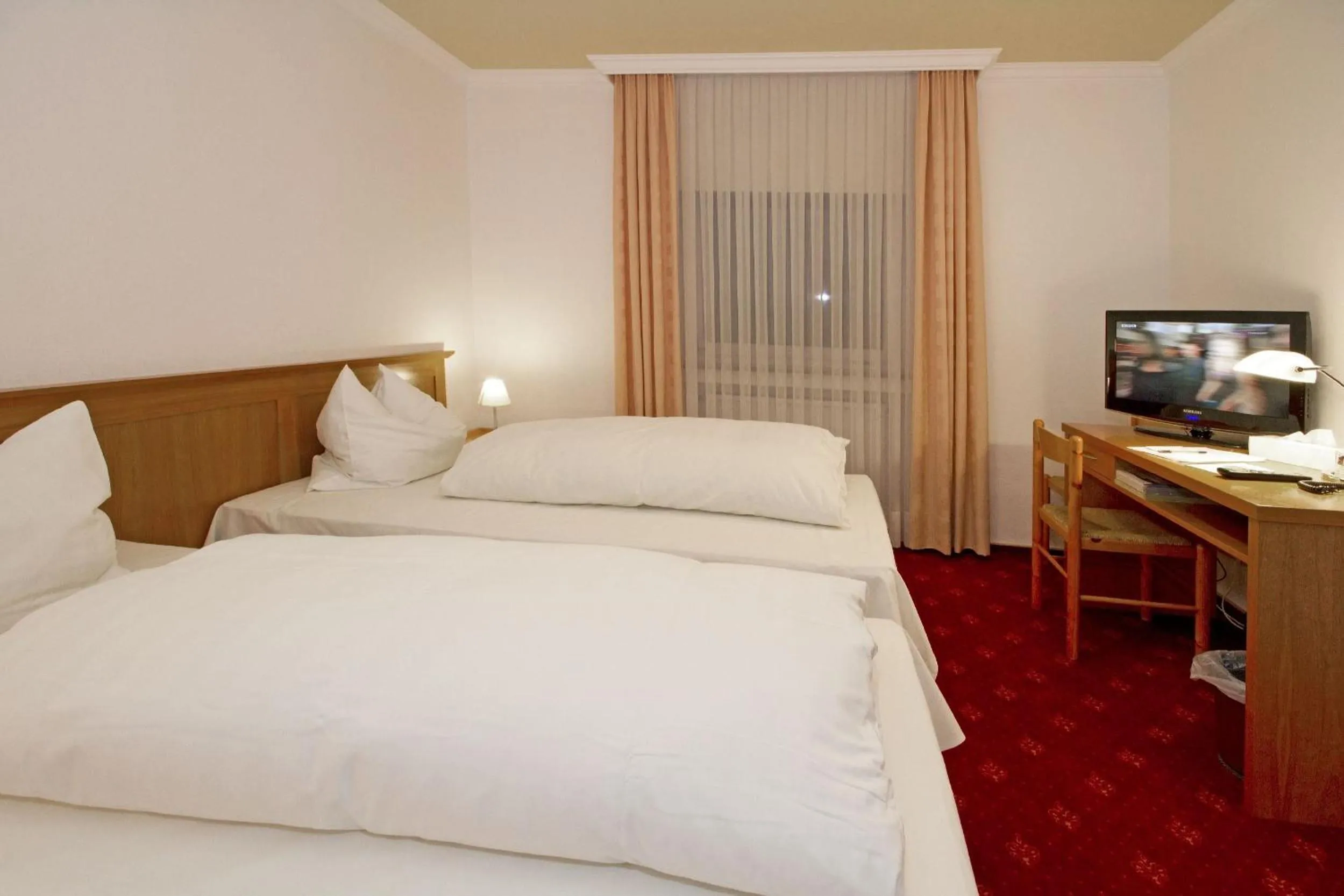 Bed in Hotel Mennicken