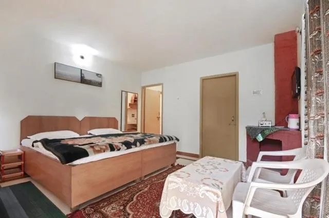 Bed in Janardan Resort Pangot Nainital