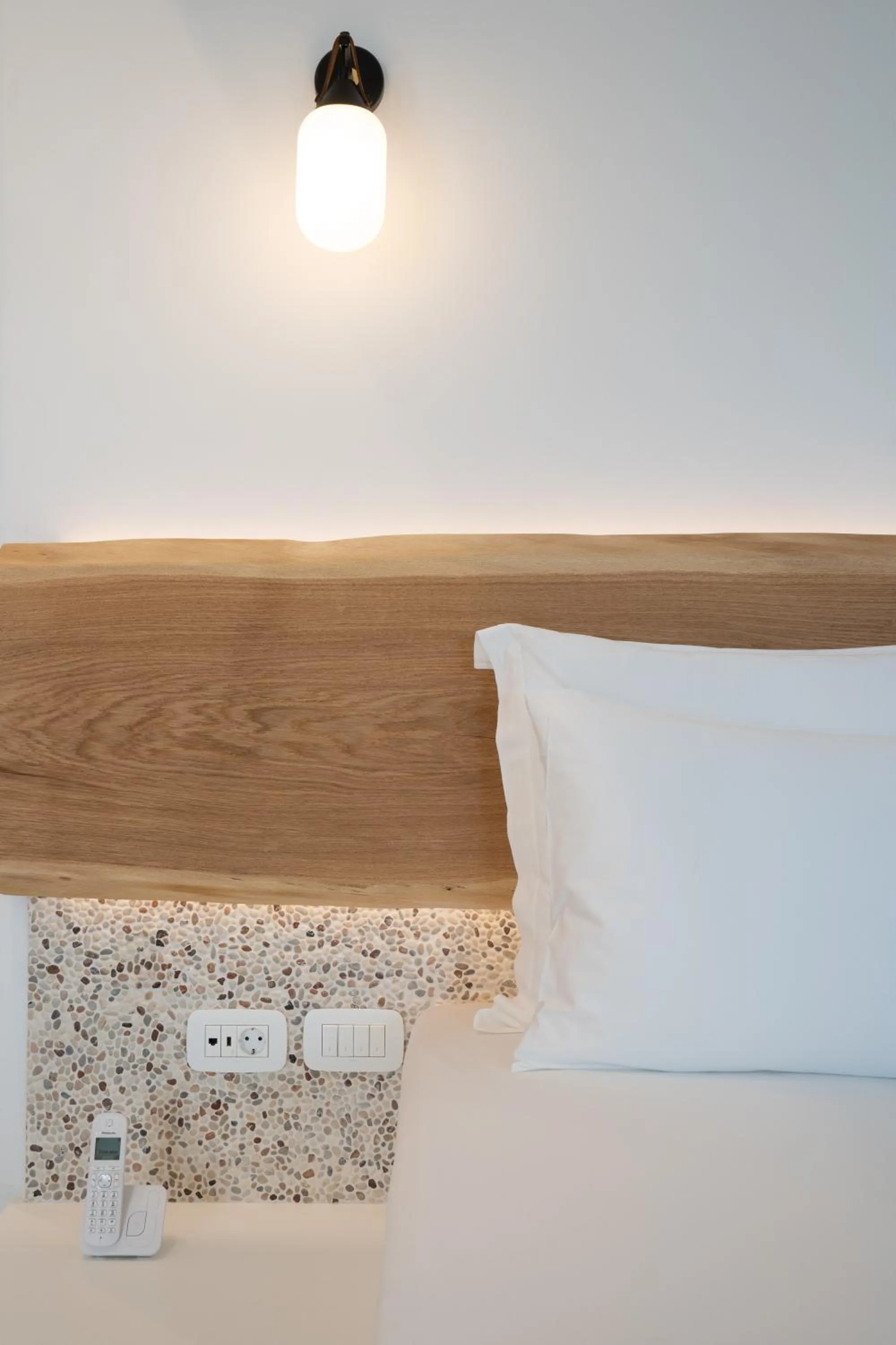 Bed in La Ponta Villas & Suites