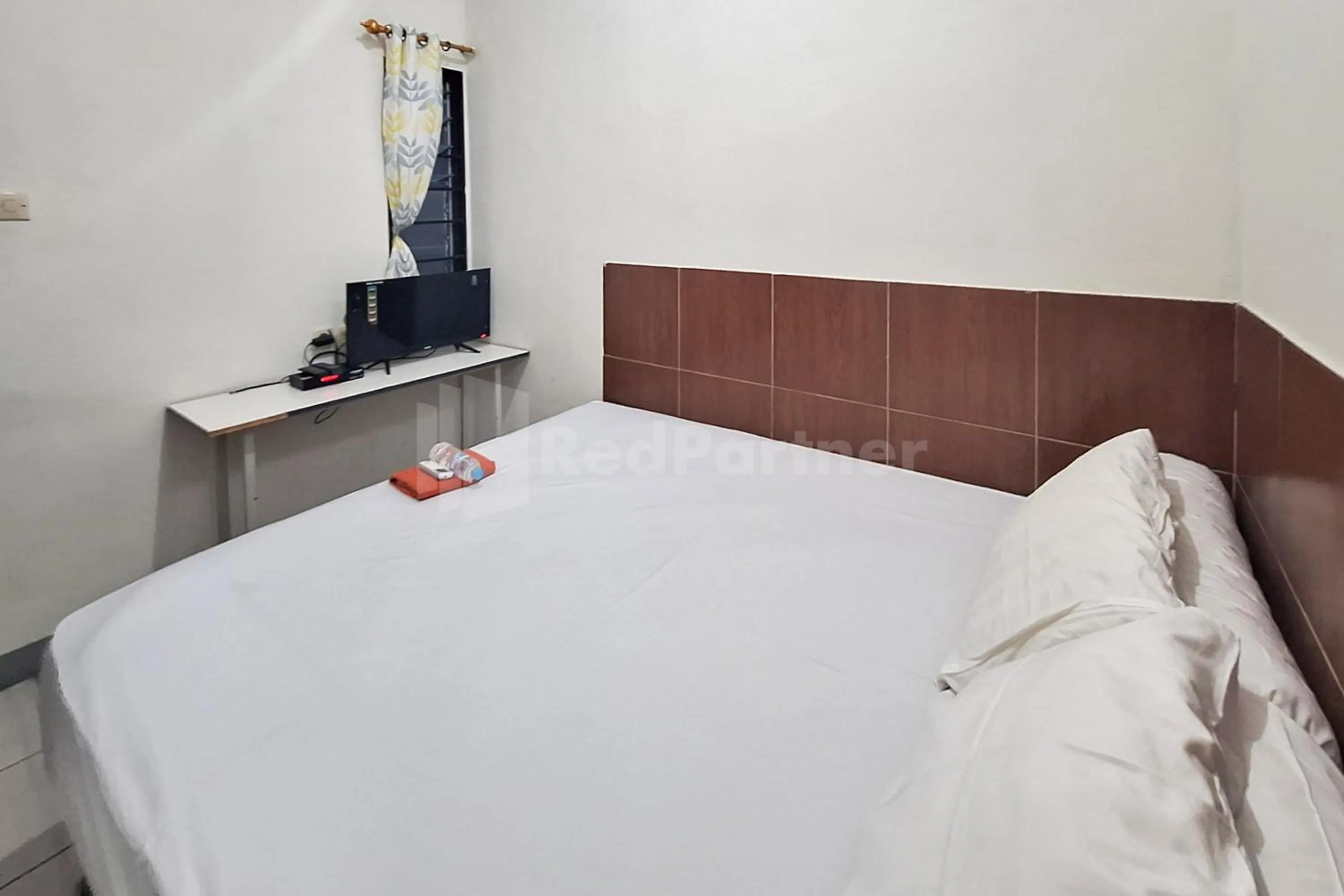 Bed in Joy Homestay At Pulomas RedPartner